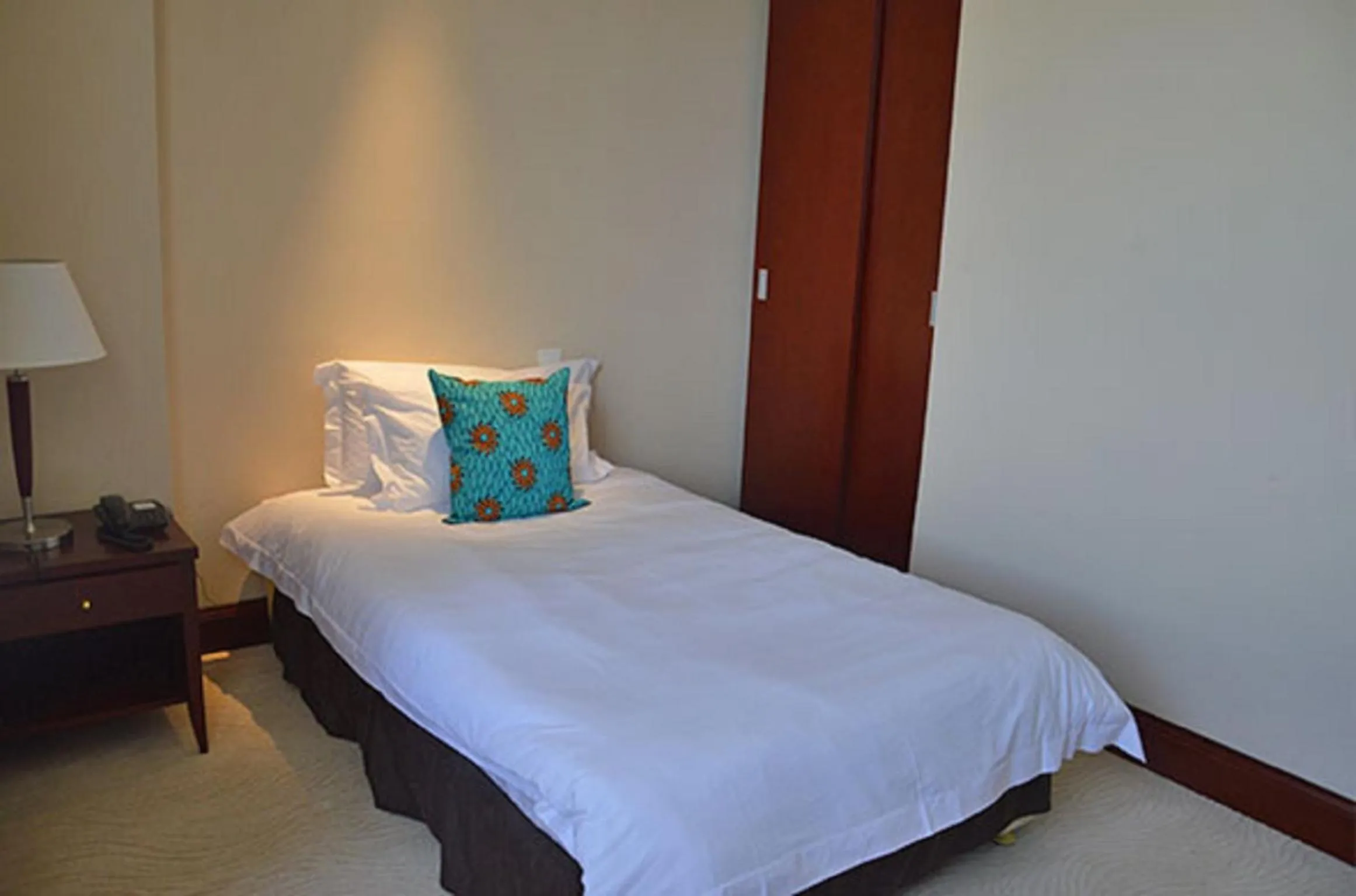 Photo of the whole room, Bed in President Hotel at Umodzi Park