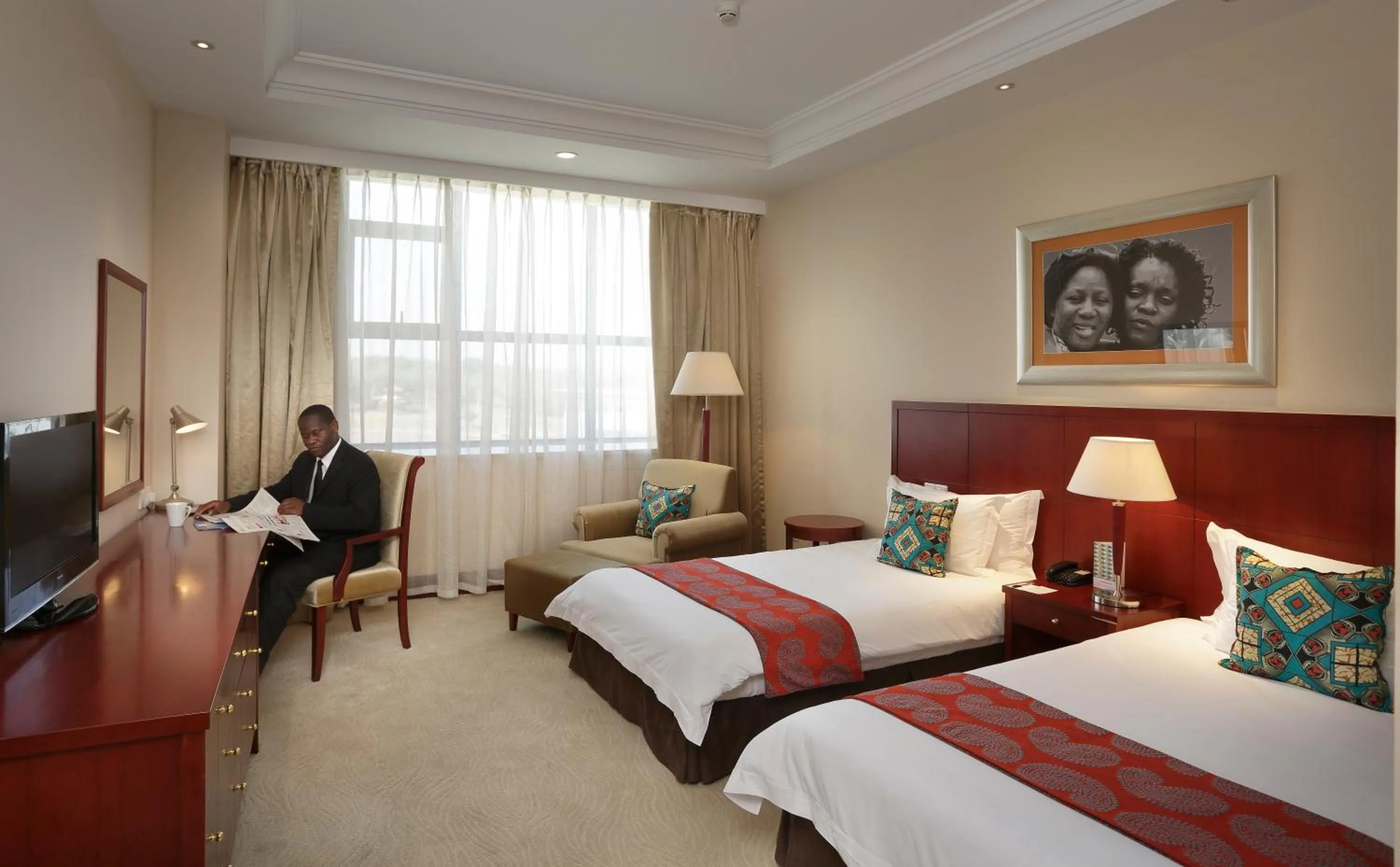 Photo of the whole room, Bed in President Hotel at Umodzi Park
