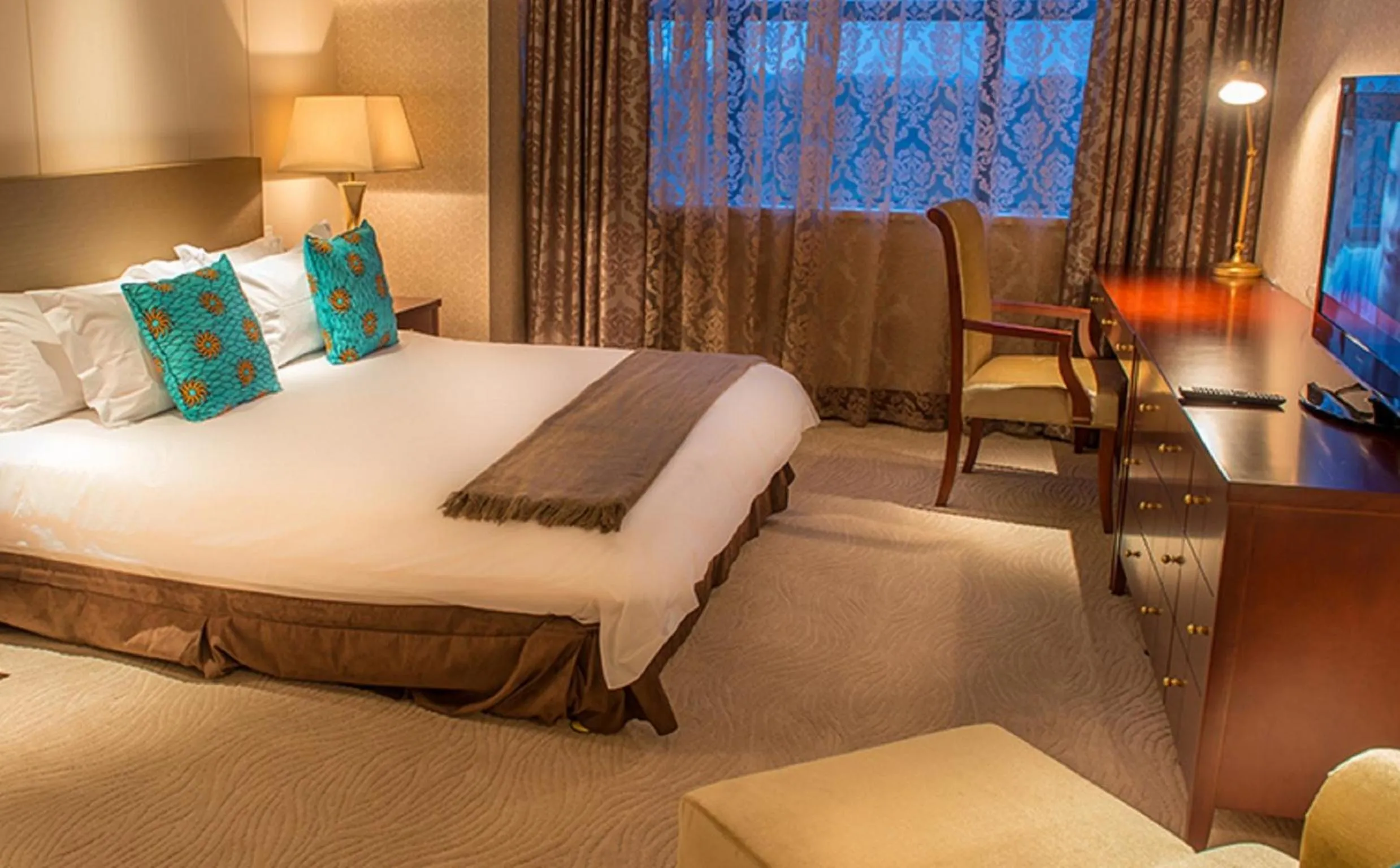 Bed in President Hotel at Umodzi Park