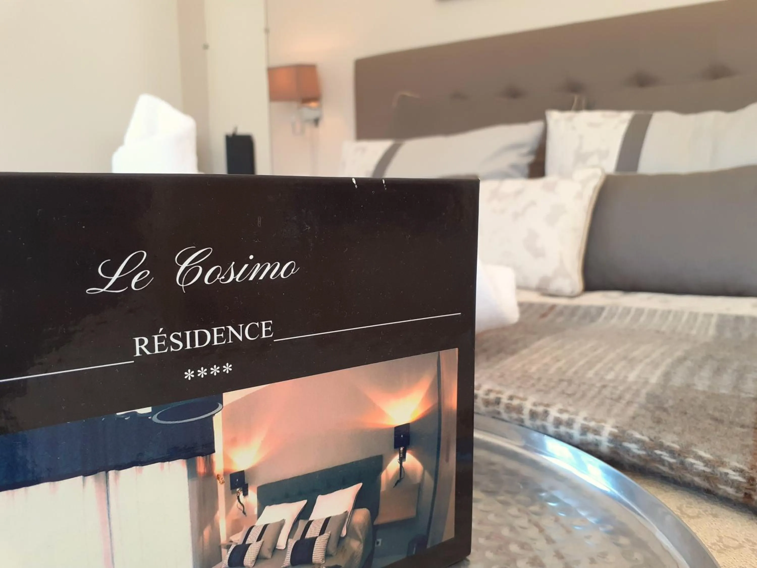 Property logo or sign in Résidence Le Cosimo