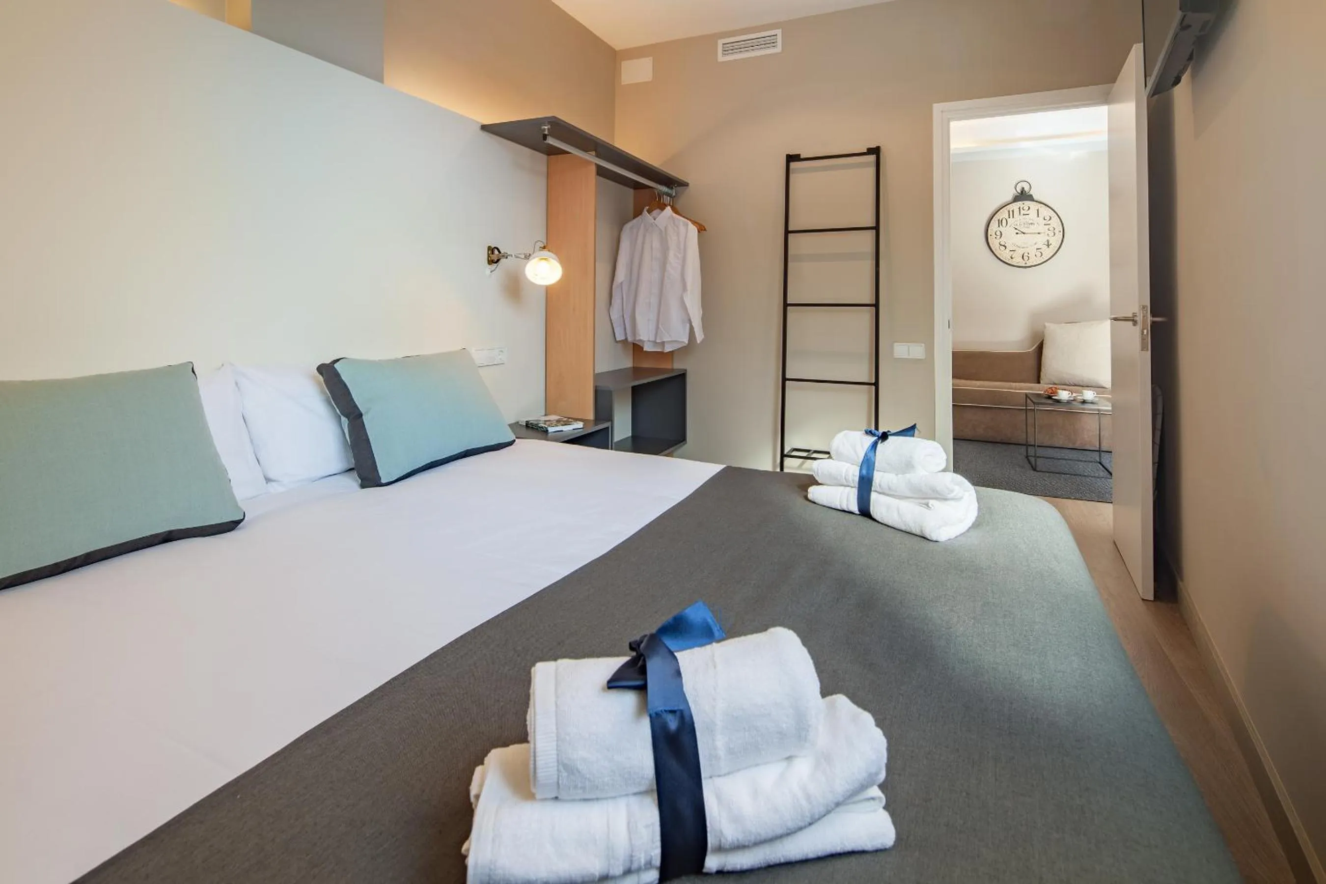 Bedroom, Bed in Habitat Apartments Cool Jazz