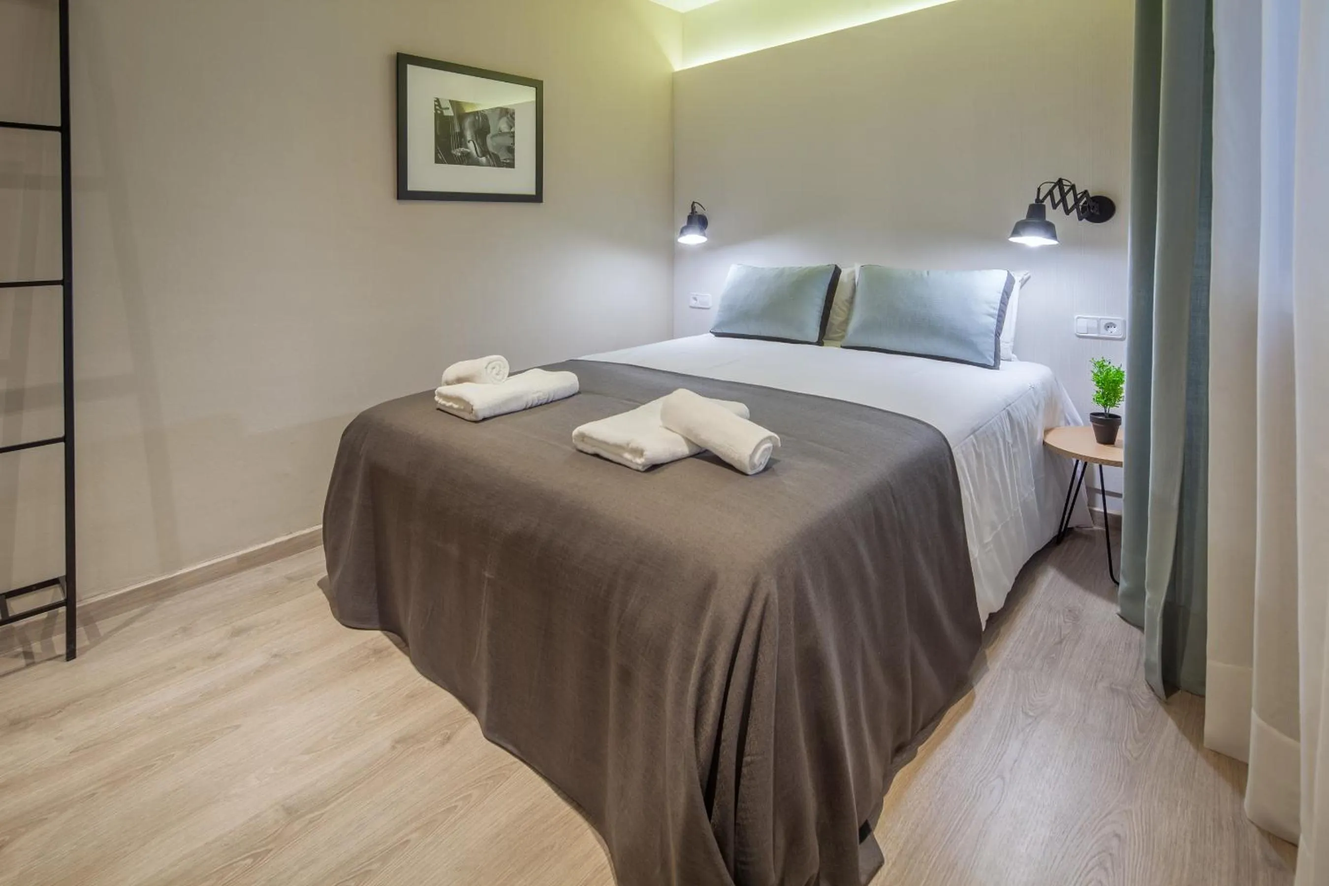 Bedroom, Bed in Habitat Apartments Cool Jazz