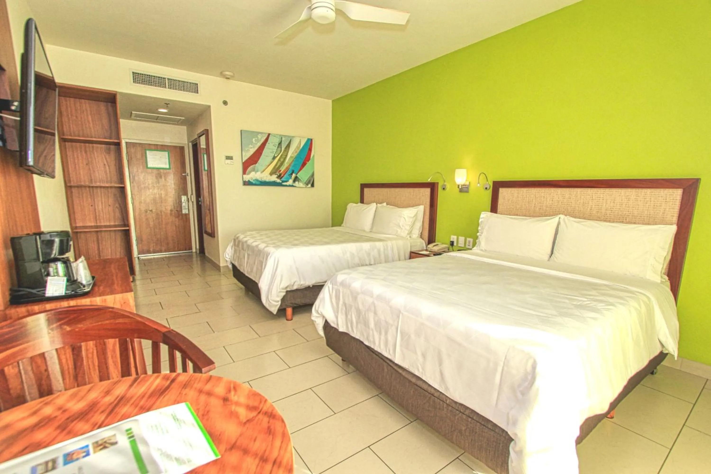 Photo of the whole room, Bed in Holiday Inn Huatulco by IHG