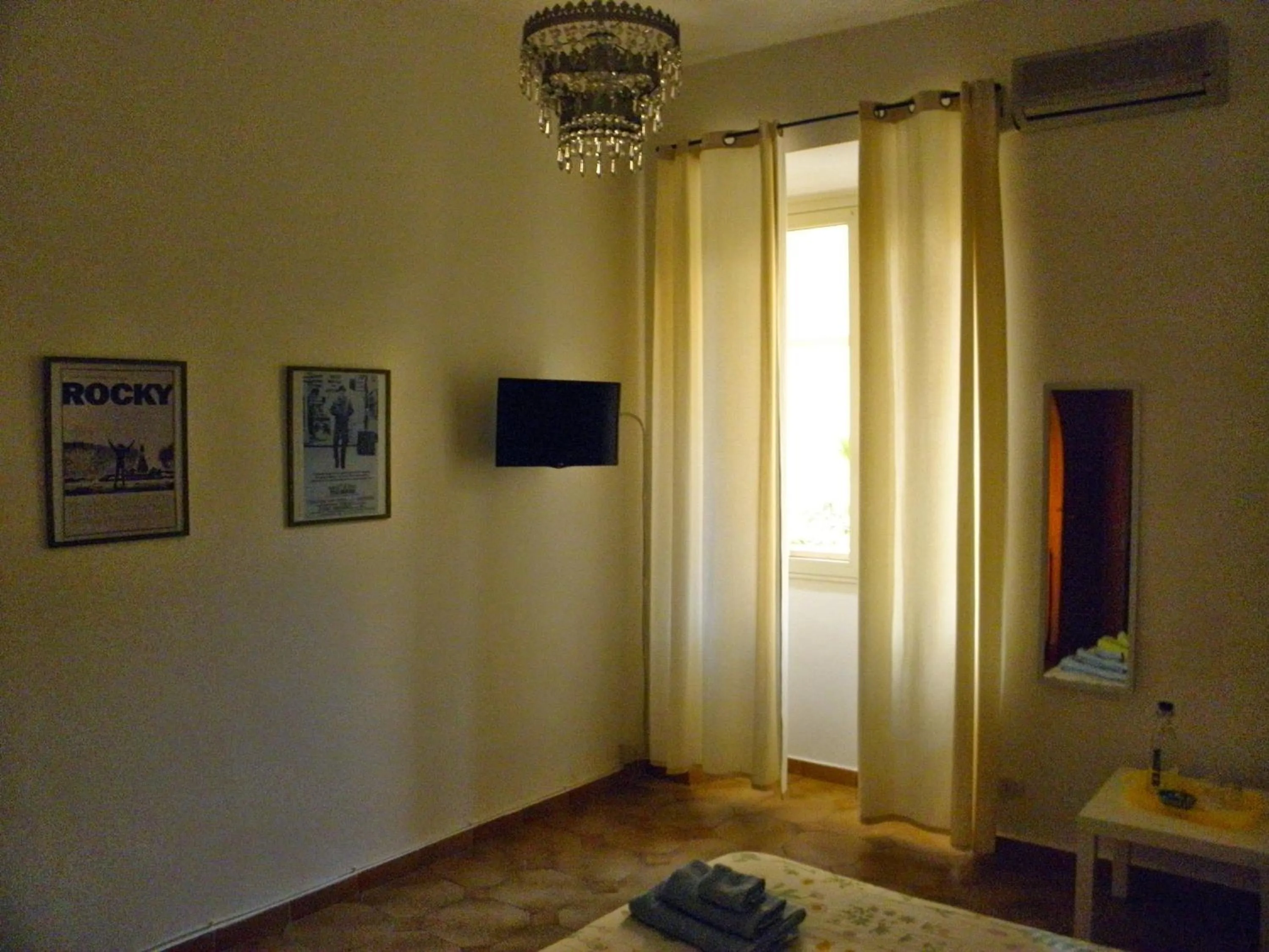 TV and multimedia, TV/Entertainment Center in Alfieri B&B