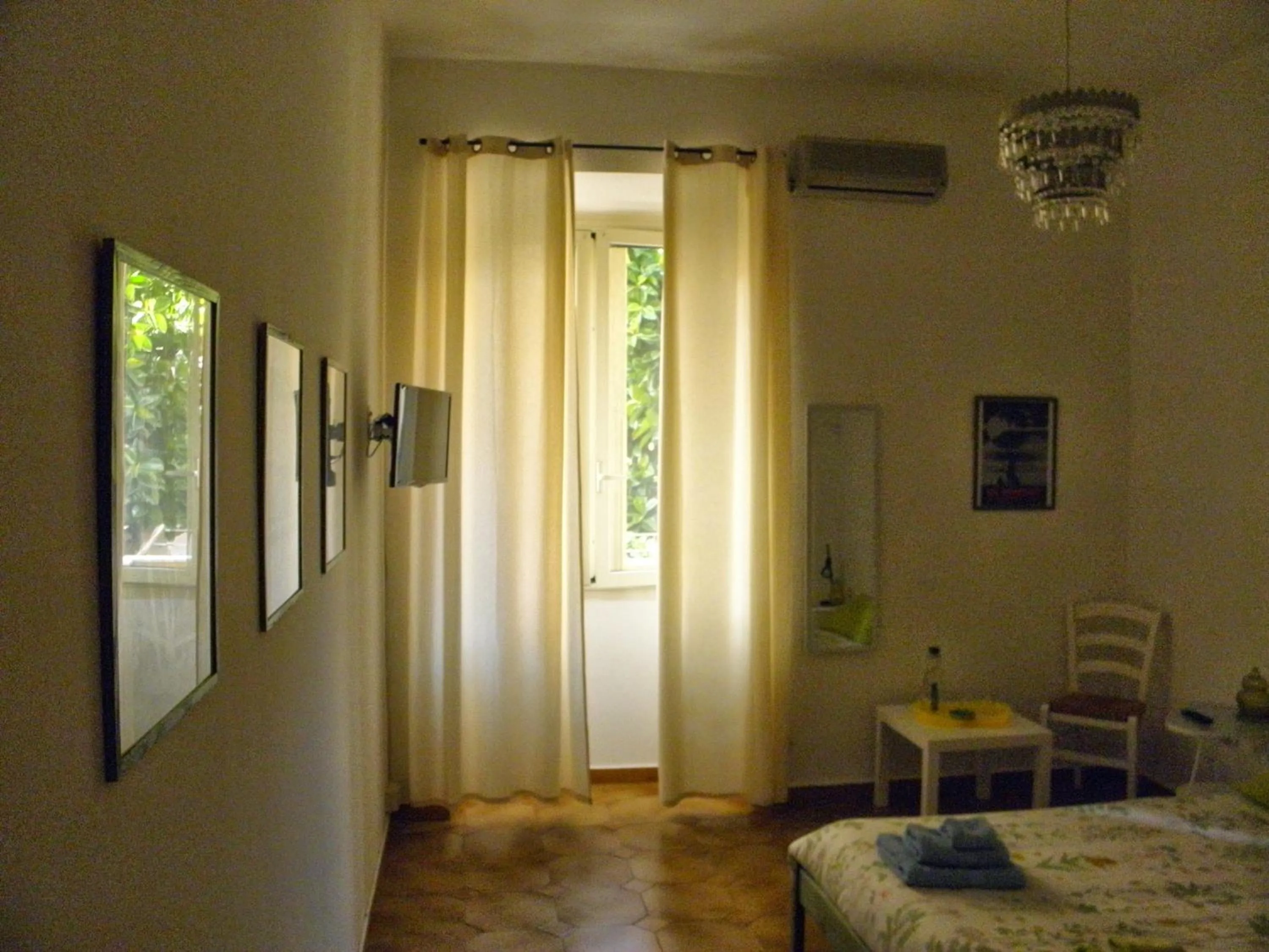 Bedroom, TV/Entertainment Center in Alfieri B&B