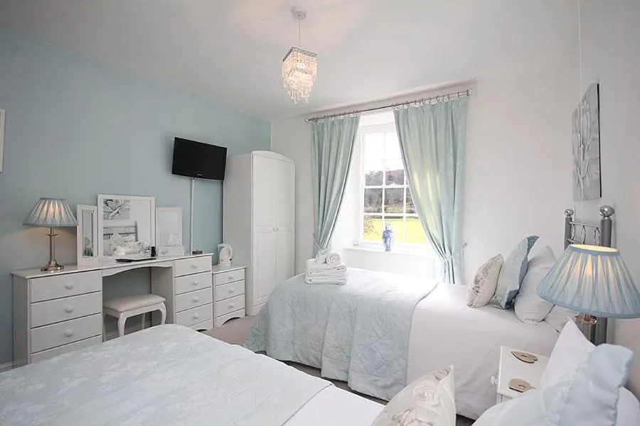 Bed in Dunster Mill House