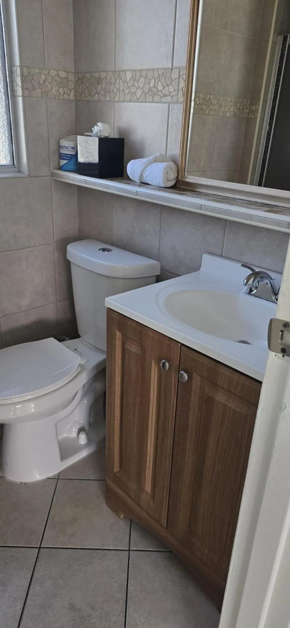 Toilet in Travelsuites Hotel