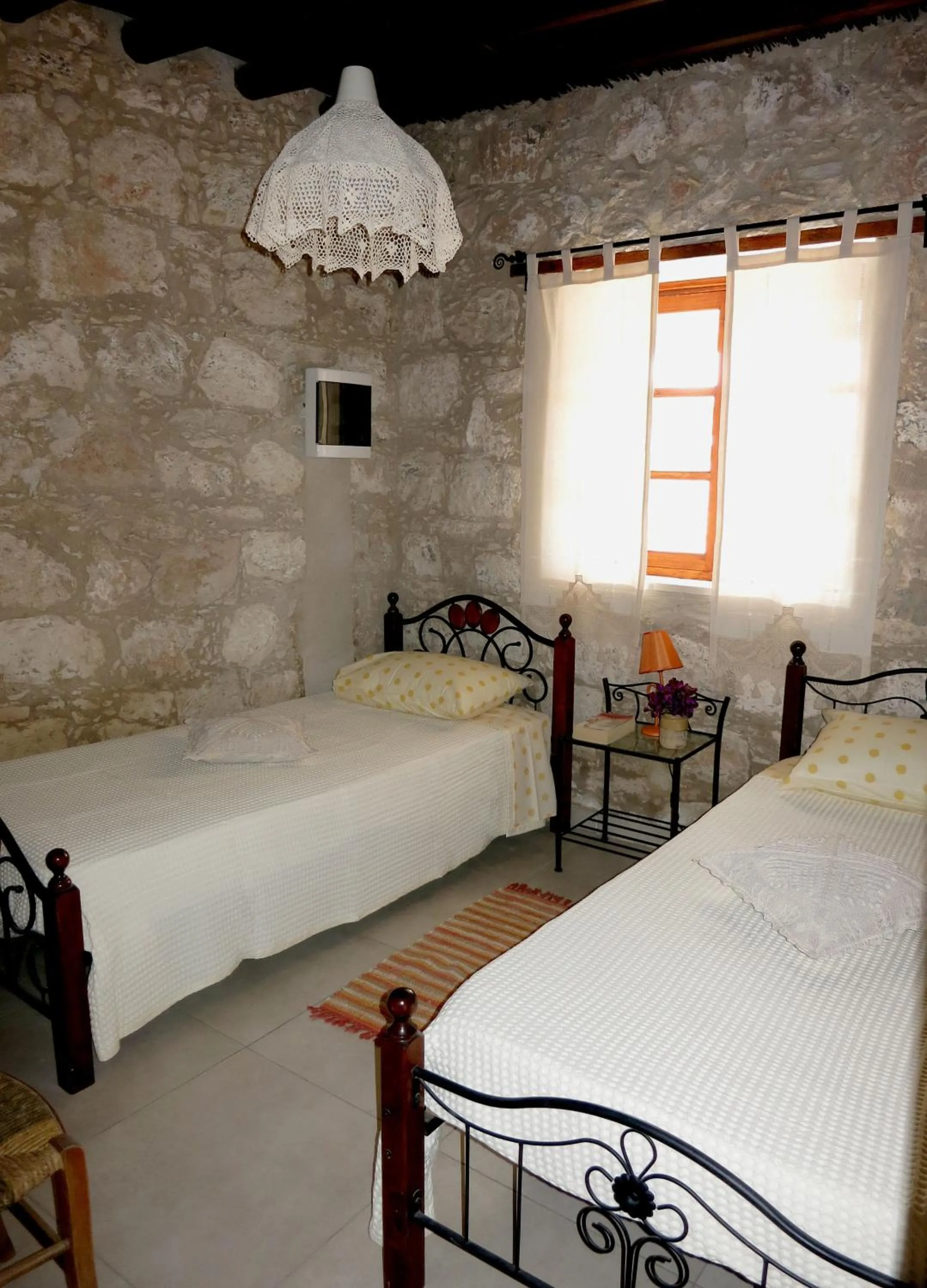 Photo of the whole room, Bed in Simona Stone House