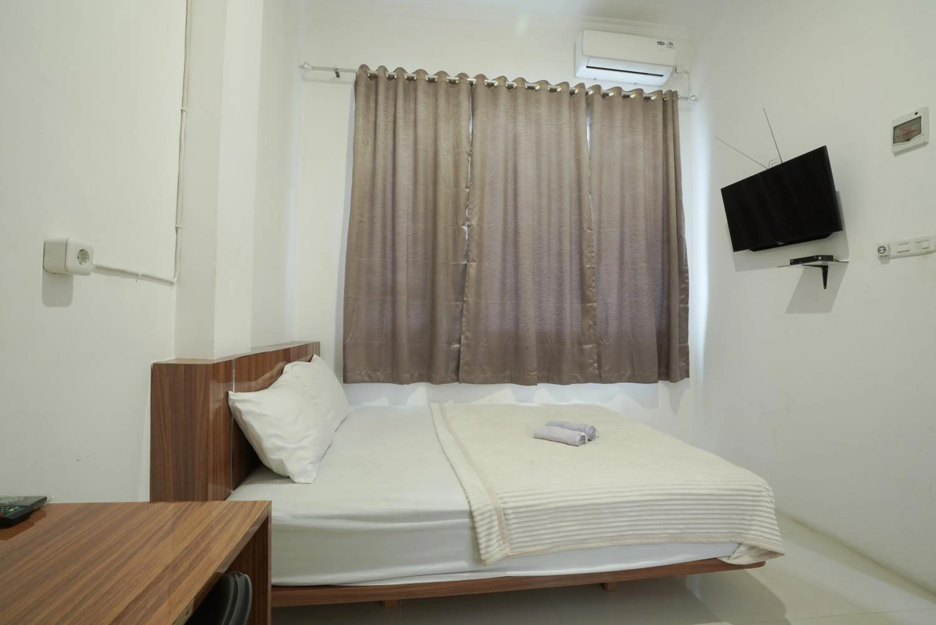 Bed in Sakura Guesthouse & Spa