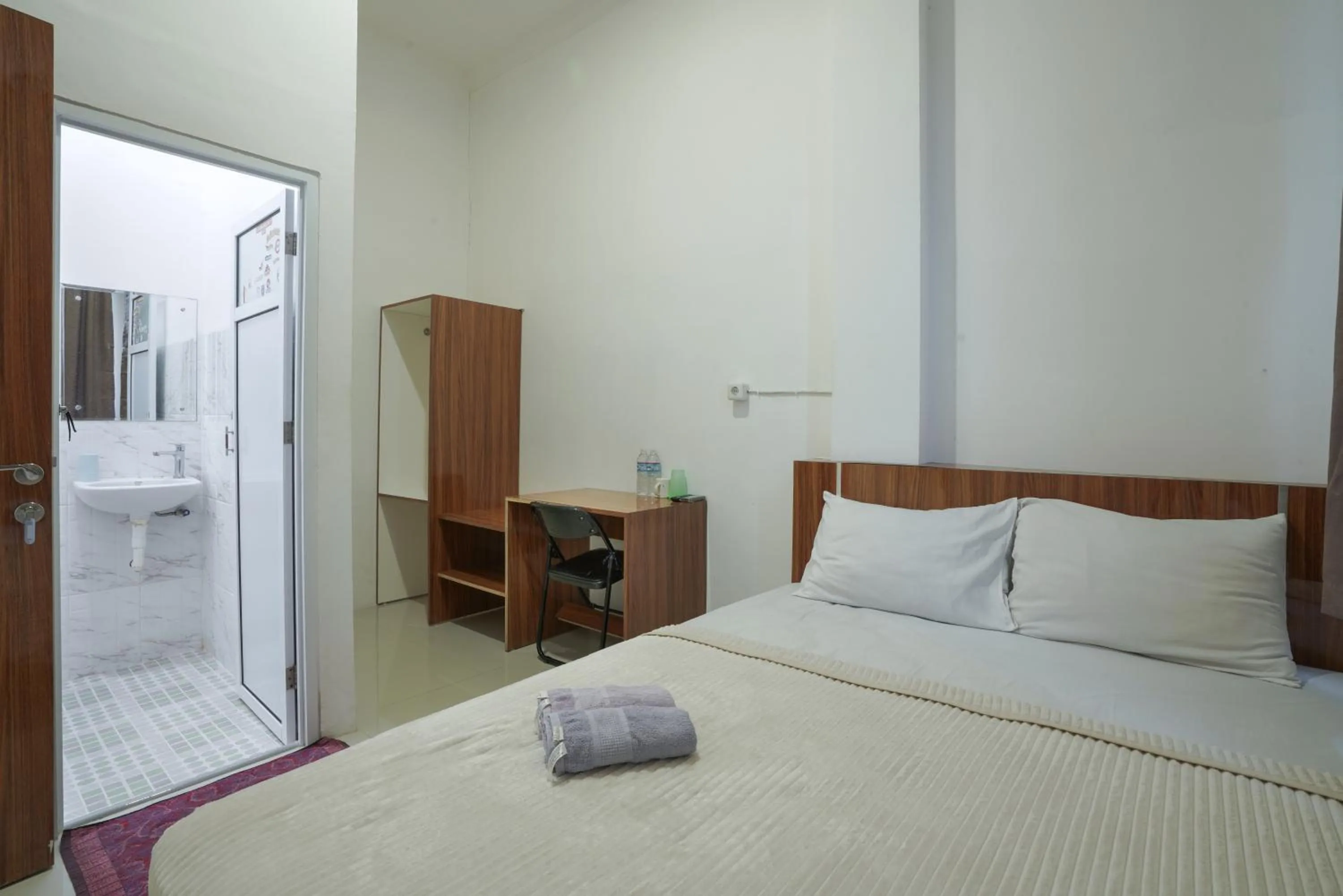 Bed in Sakura Guesthouse & Spa