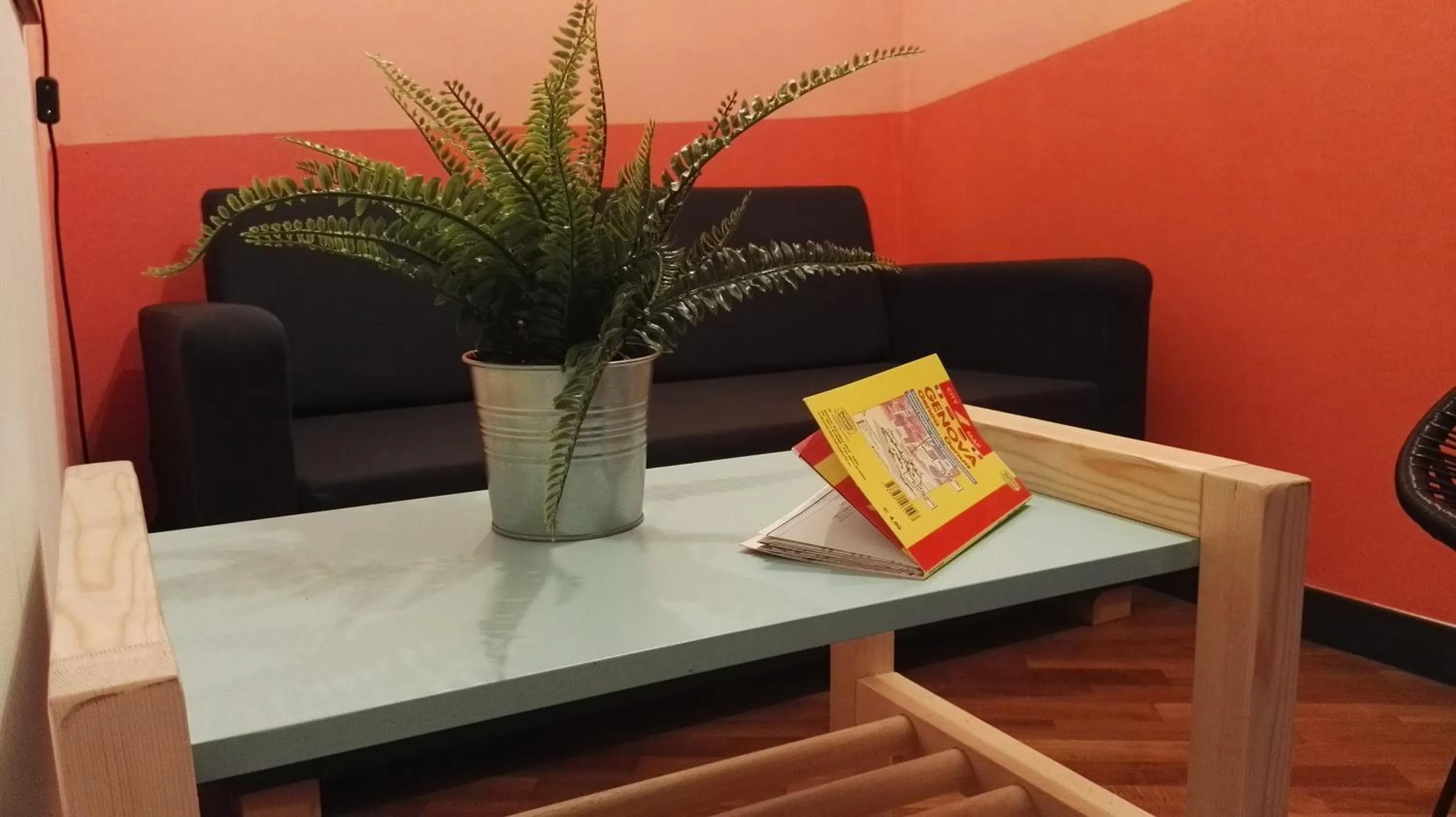 Seating area in OStellin Genova Hostel