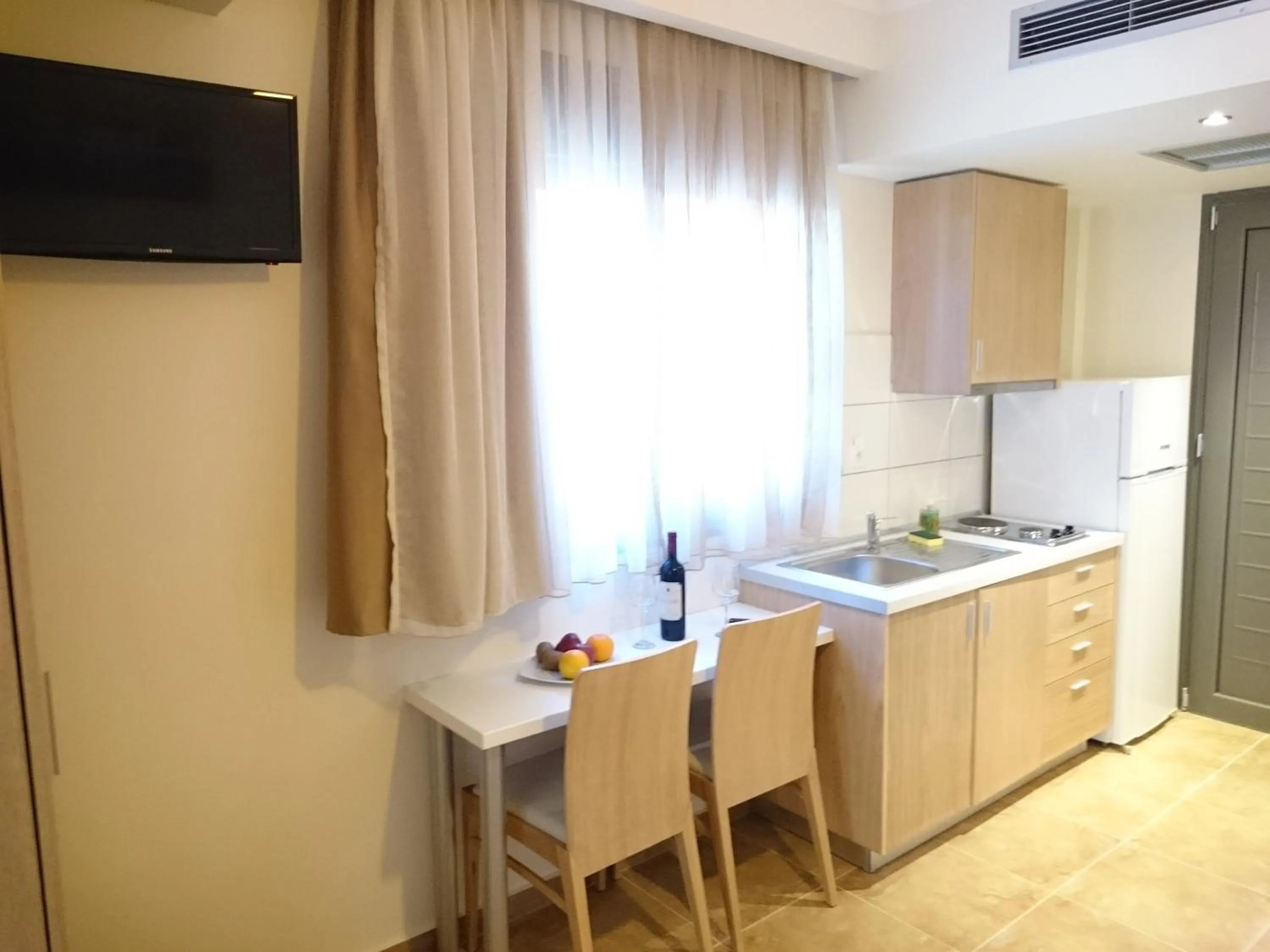 Kitchen or kitchenette in Artemis Plaza
