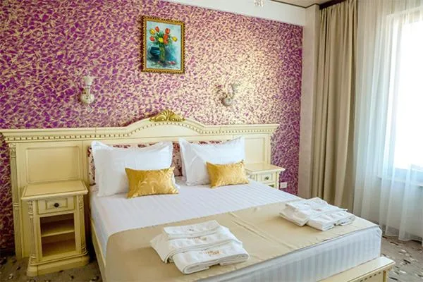 Bed in Hotel Almar Luxury