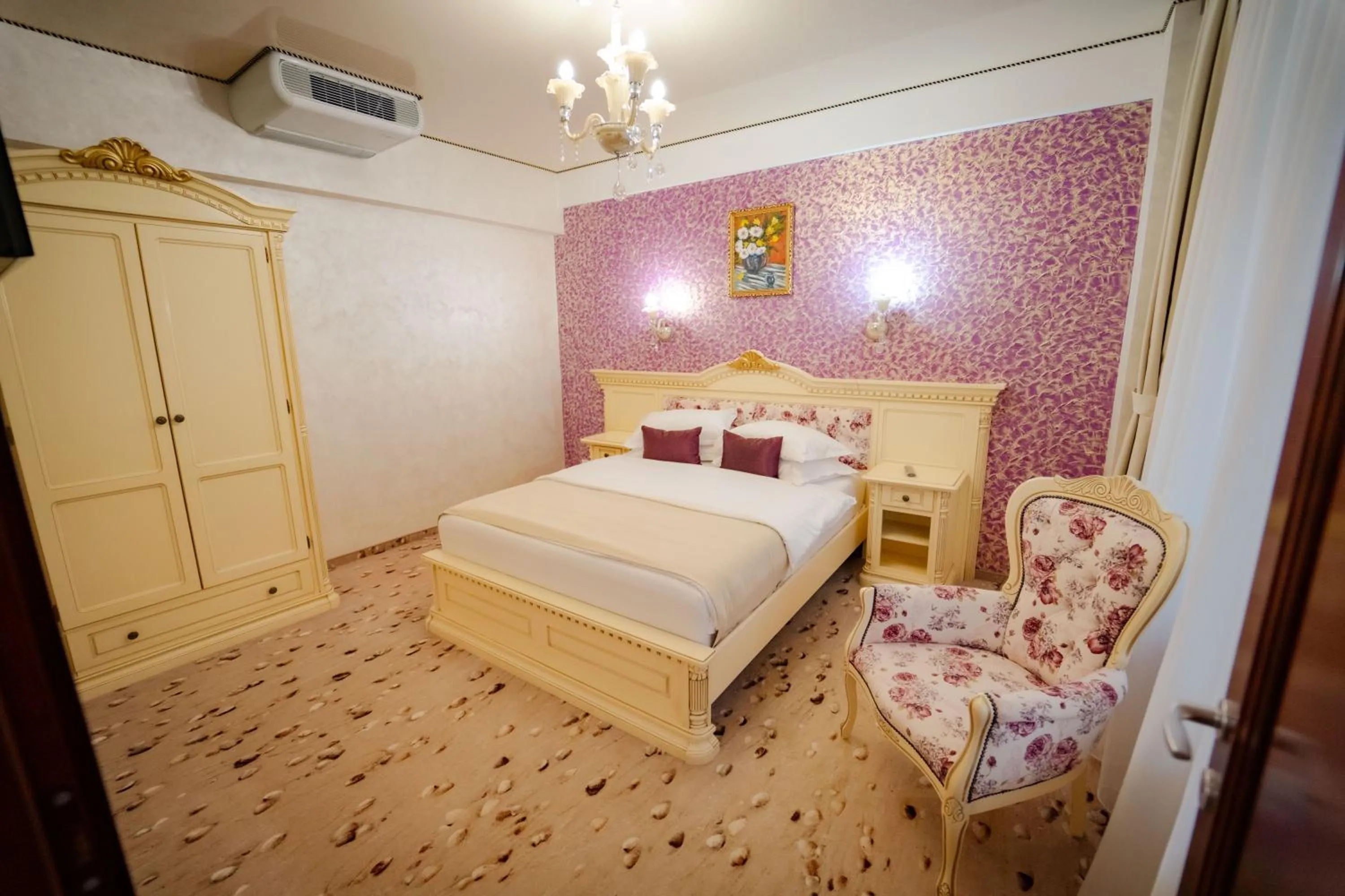Bed in Hotel Almar Luxury