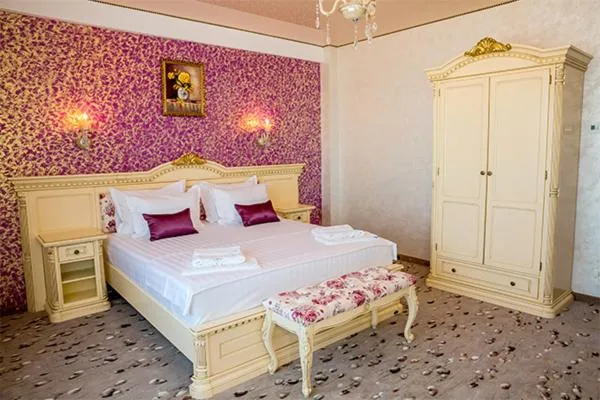 Bed in Hotel Almar Luxury