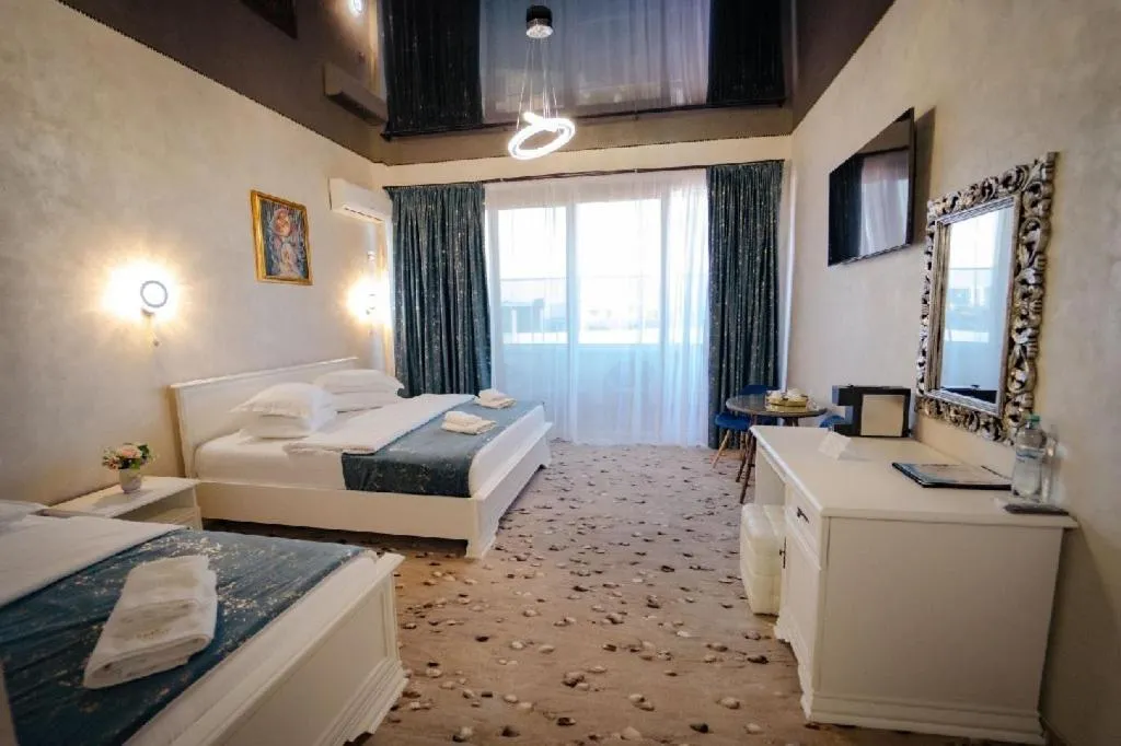 Bed in Hotel Almar Luxury