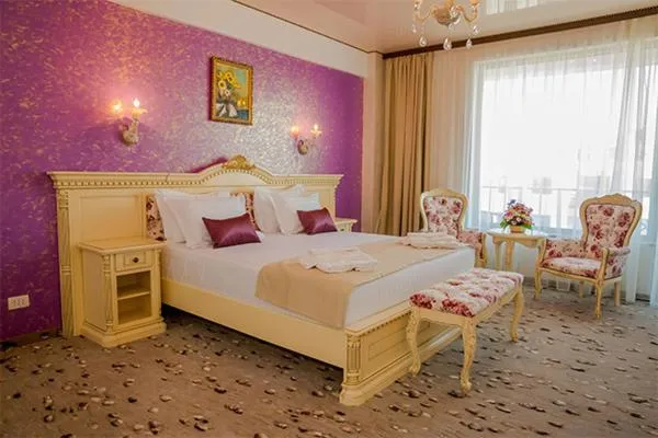 Bed in Hotel Almar Luxury