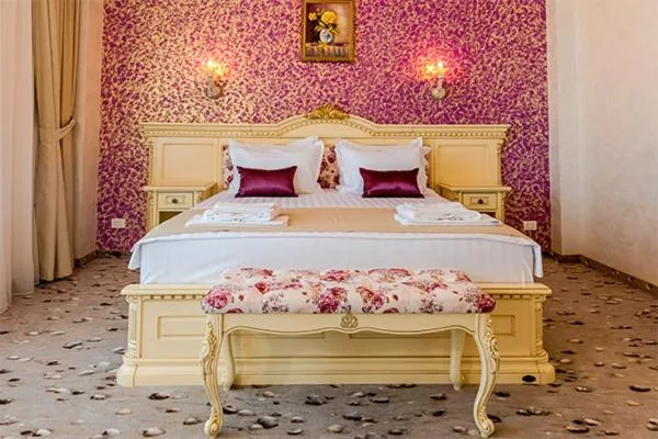 Bed in Hotel Almar Luxury