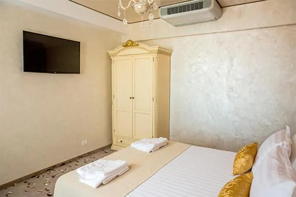 Bed in Hotel Almar Luxury