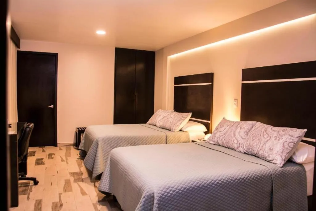 Bed in Hotel San José Plaza Coatepec