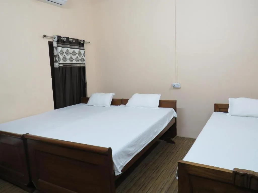 Bed in Shaw Guest House