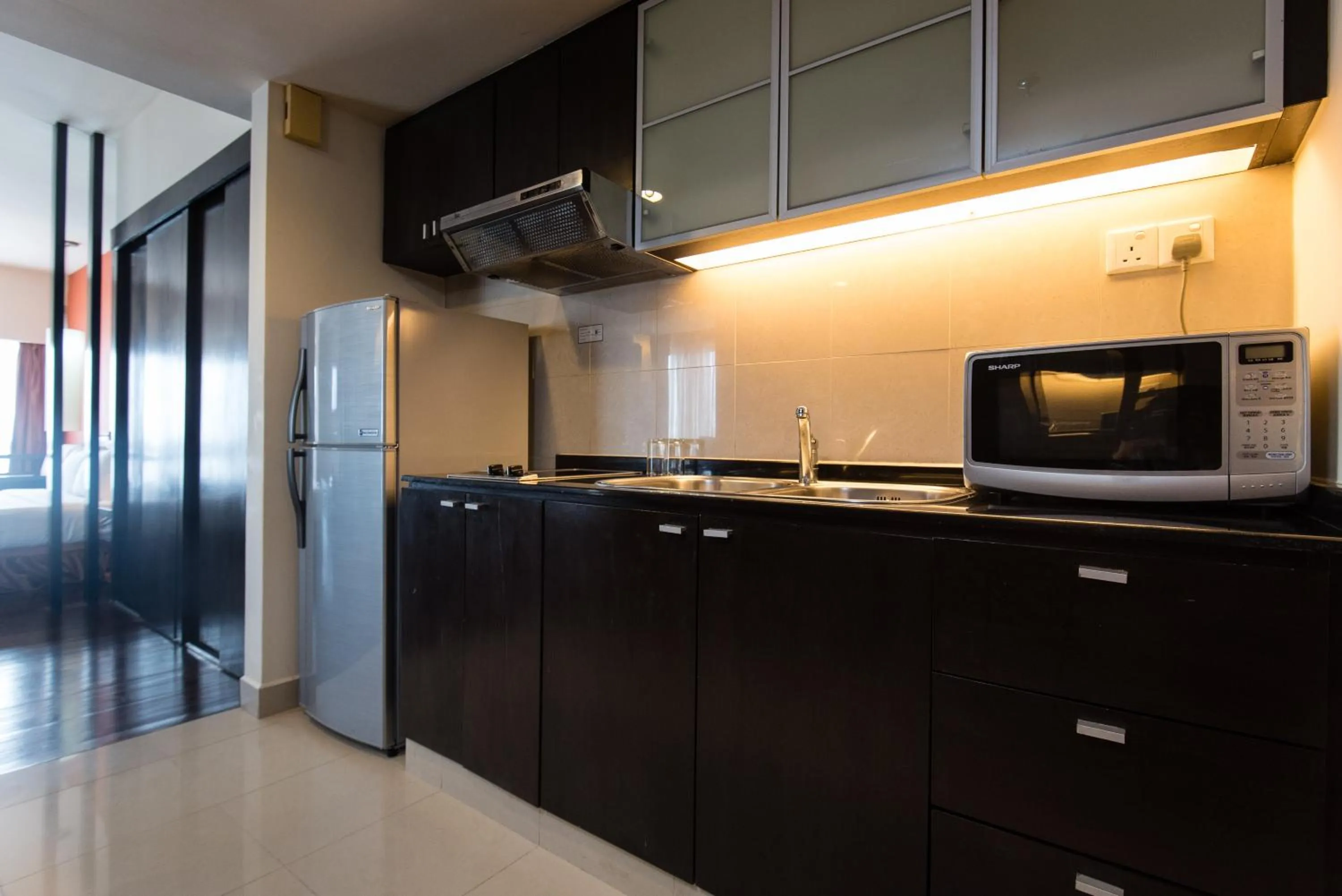 Kitchen or kitchenette in Resort Suites at Bandar Sunway