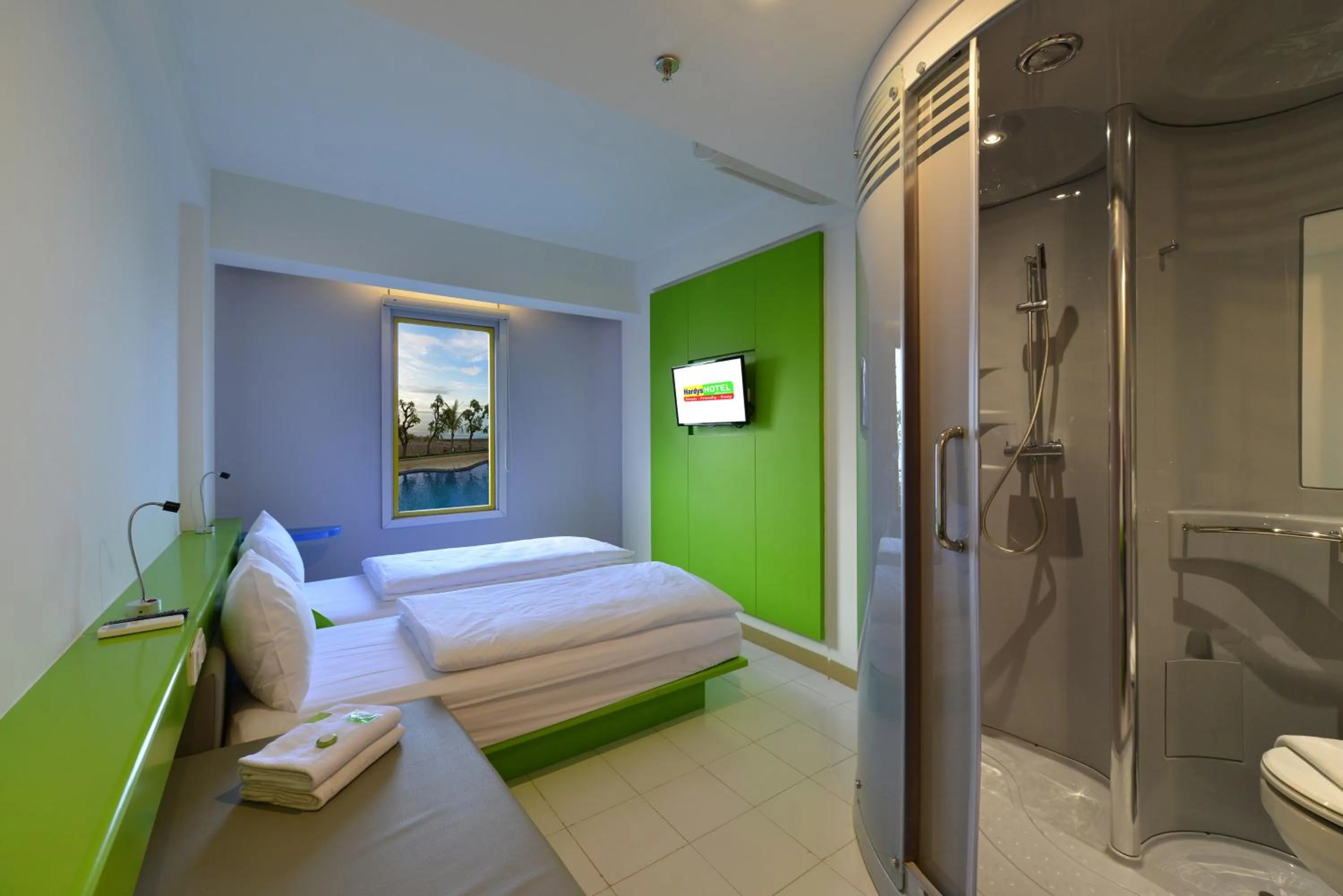 Photo of the whole room, Bed in Singaraja Beach Hotel