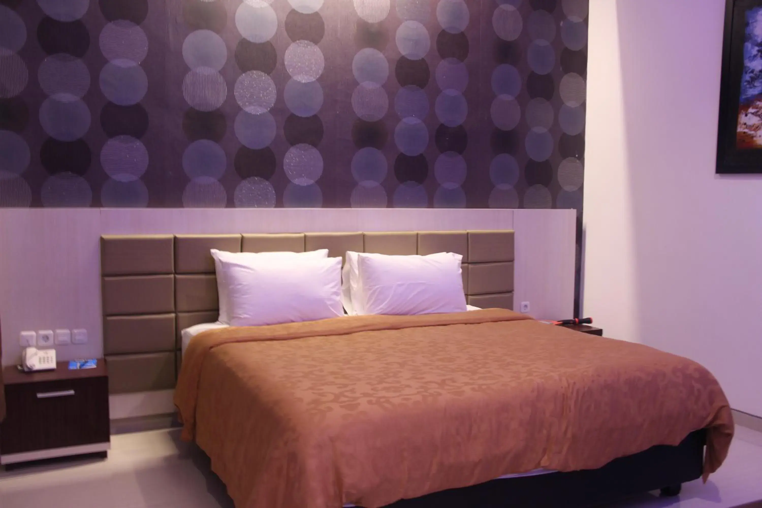 Bed in Tlogomas Guest House Bed in Tlogomas Guest House