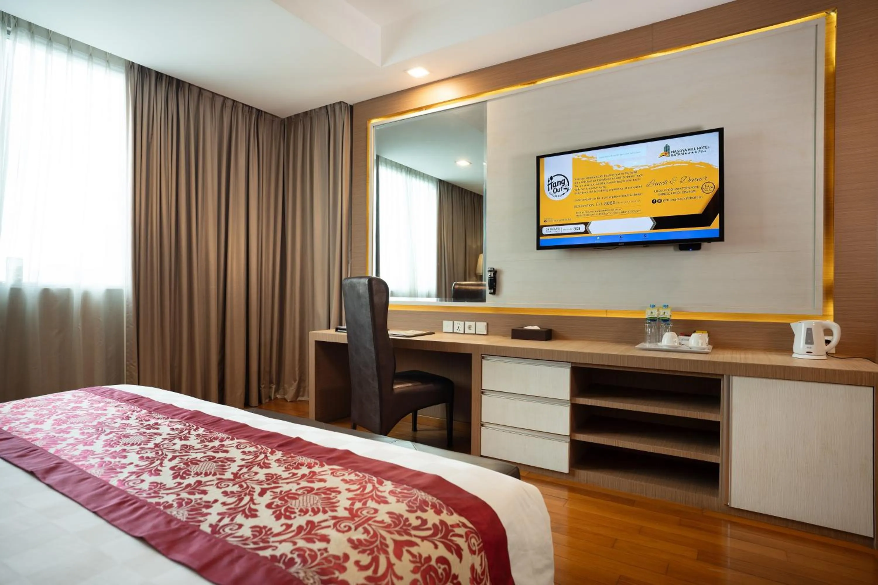 Bed in Nagoya Hill Hotel Batam