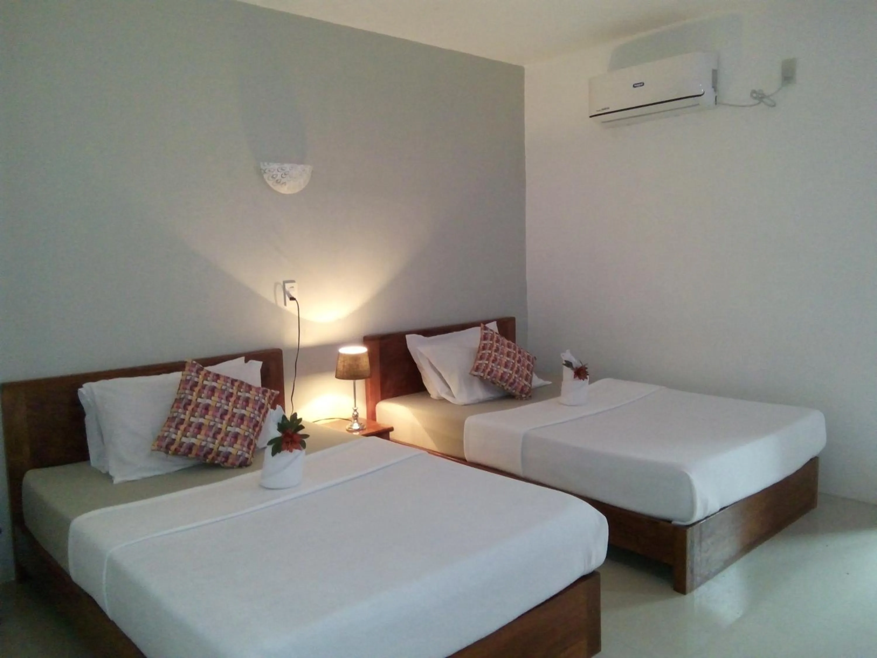 Bed in La Casa Teresa Tourist Inn Inc