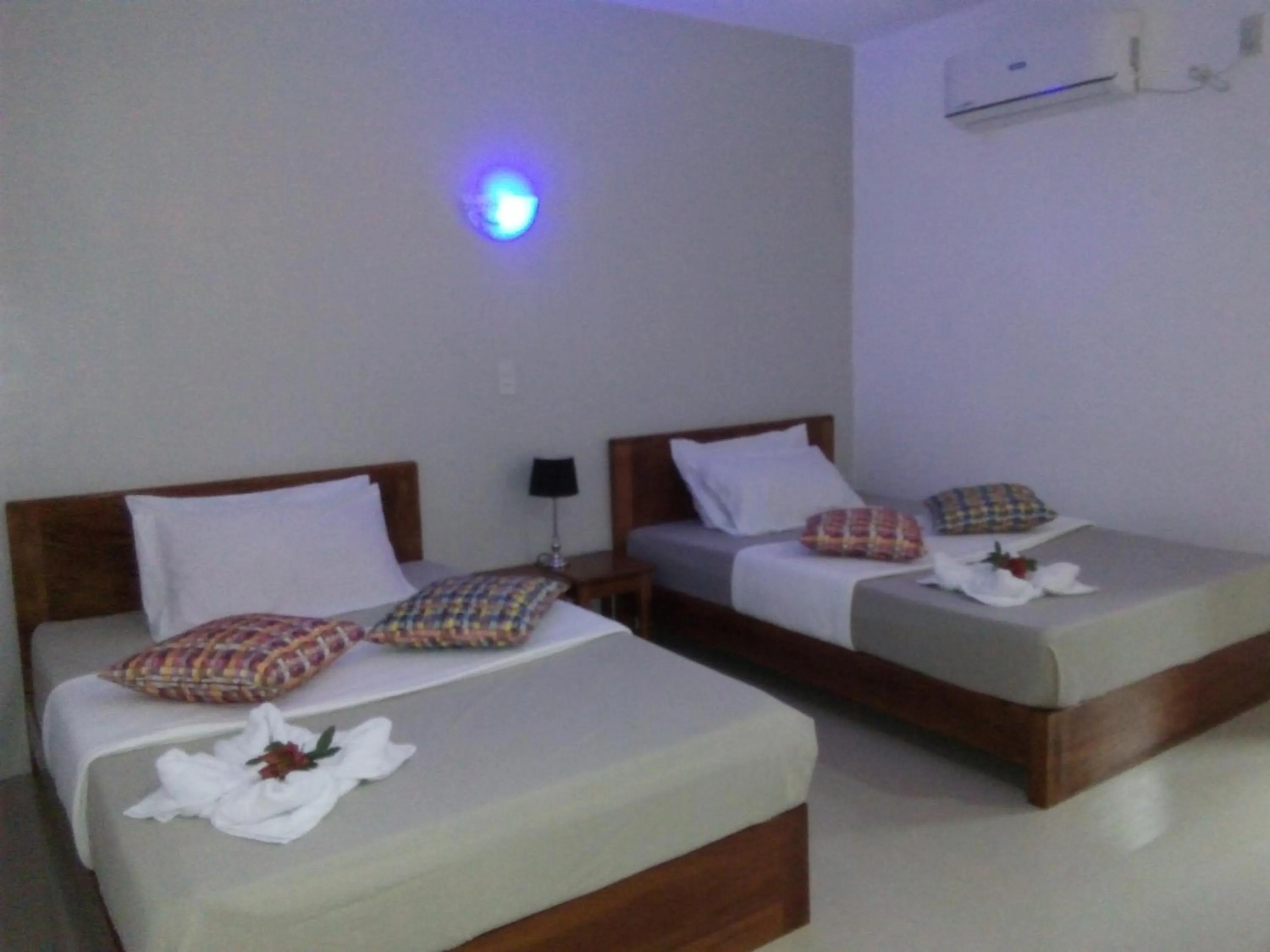 Bed in La Casa Teresa Tourist Inn Inc