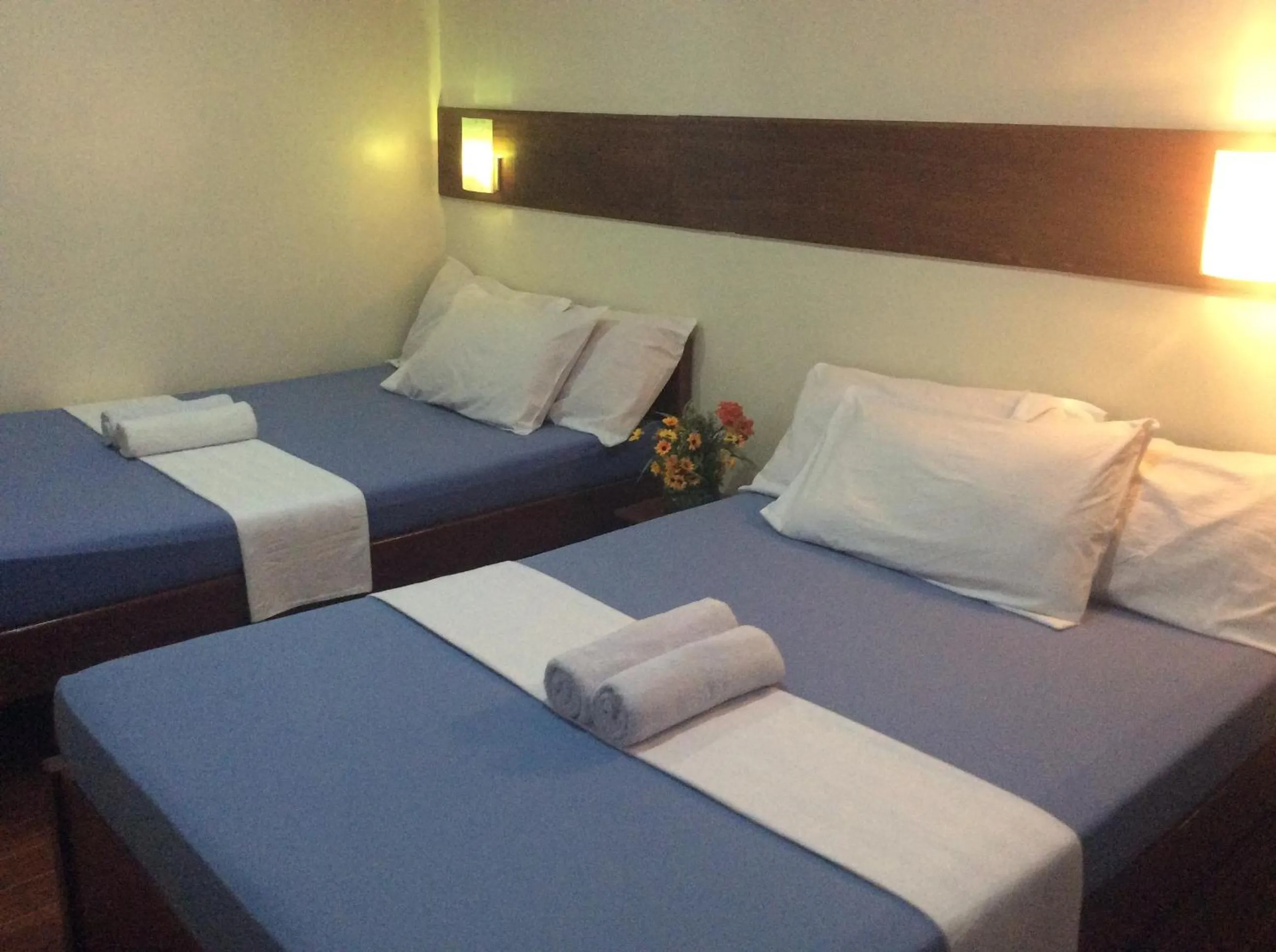 Bed in La Casa Teresa Tourist Inn Inc