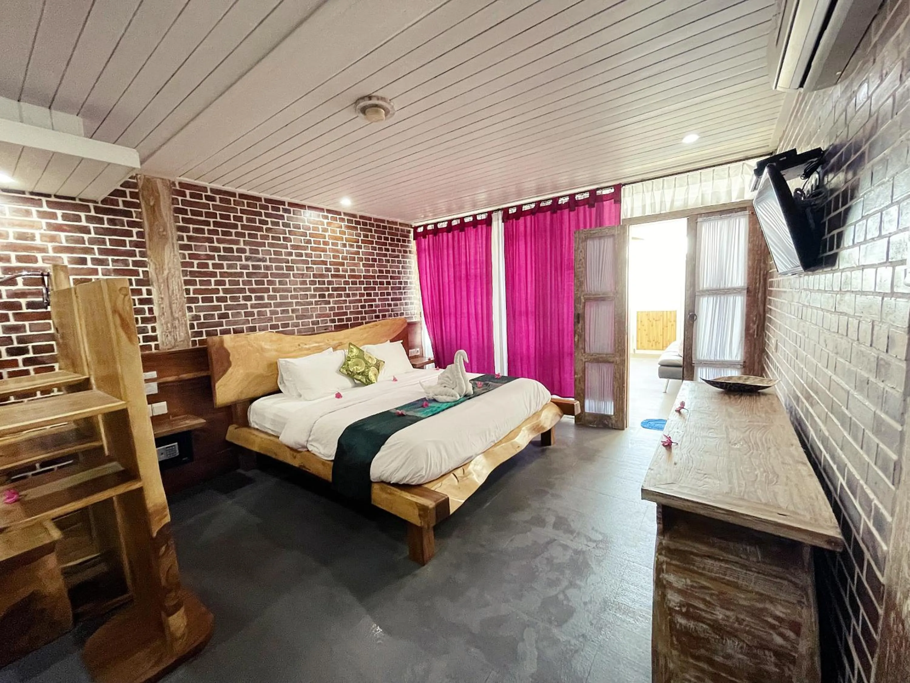 Photo of the whole room, Bed in Princess of Mentigi Bay