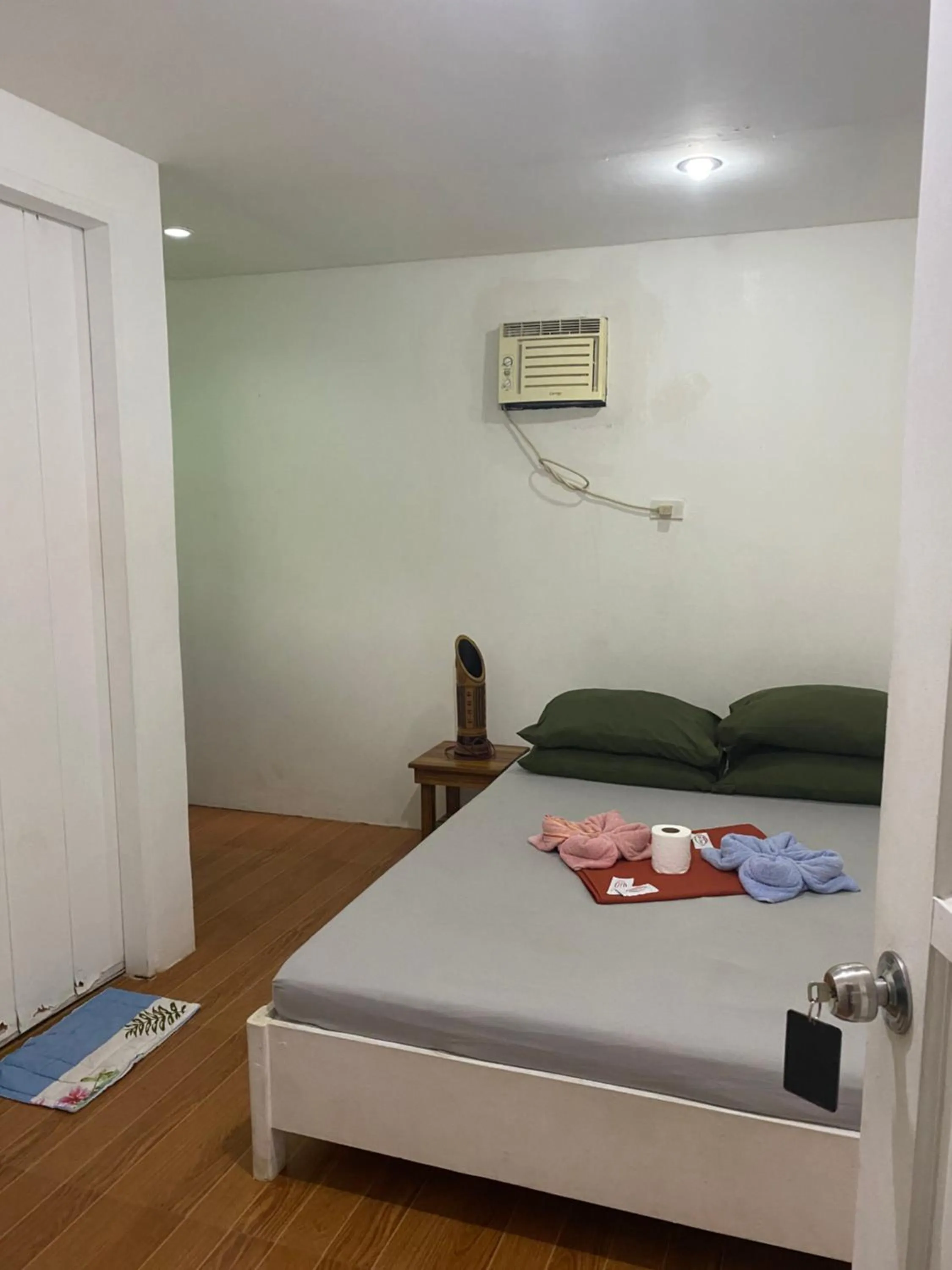 Bed in Raje Residence