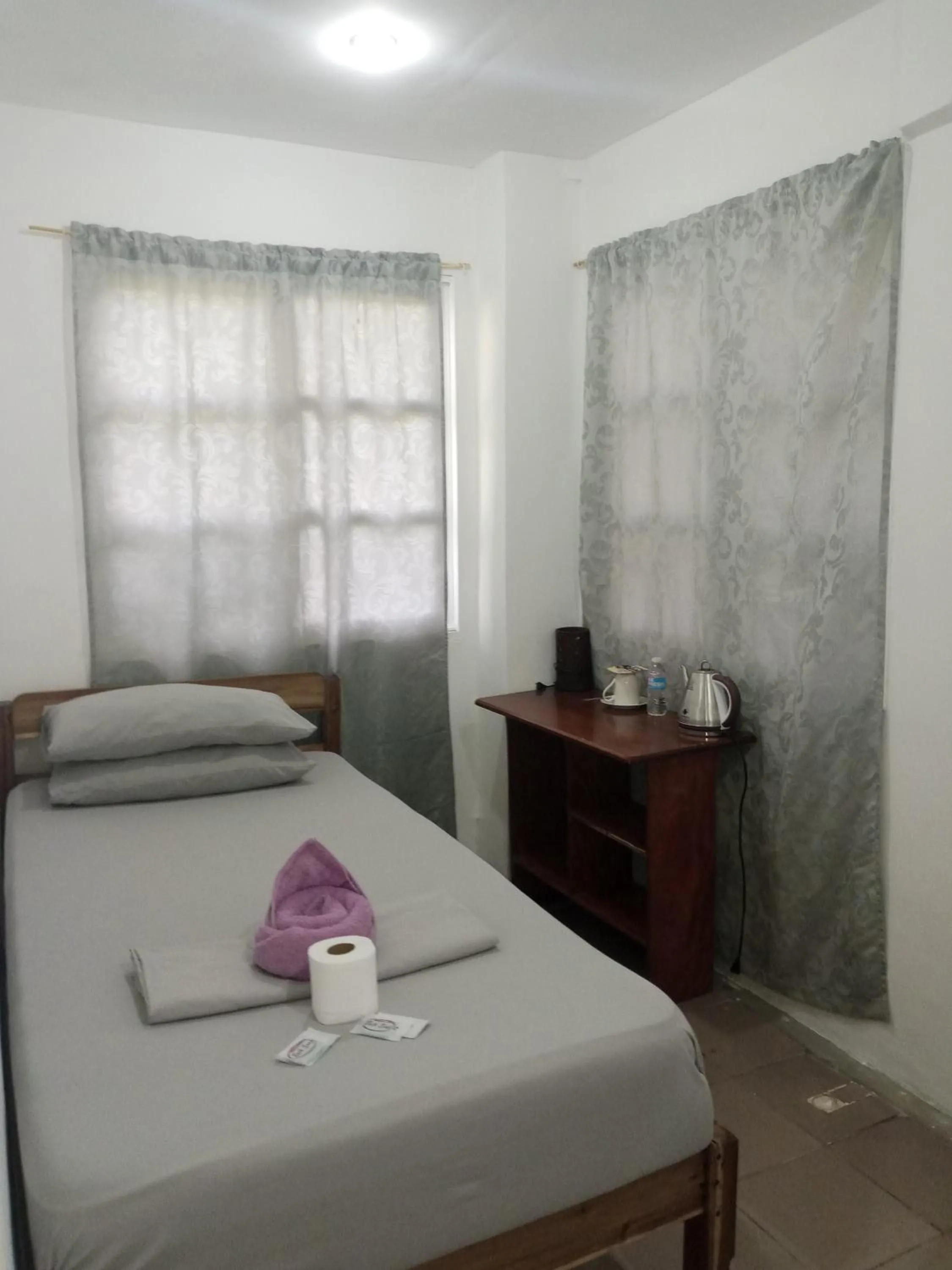 Bed in Raje Residence