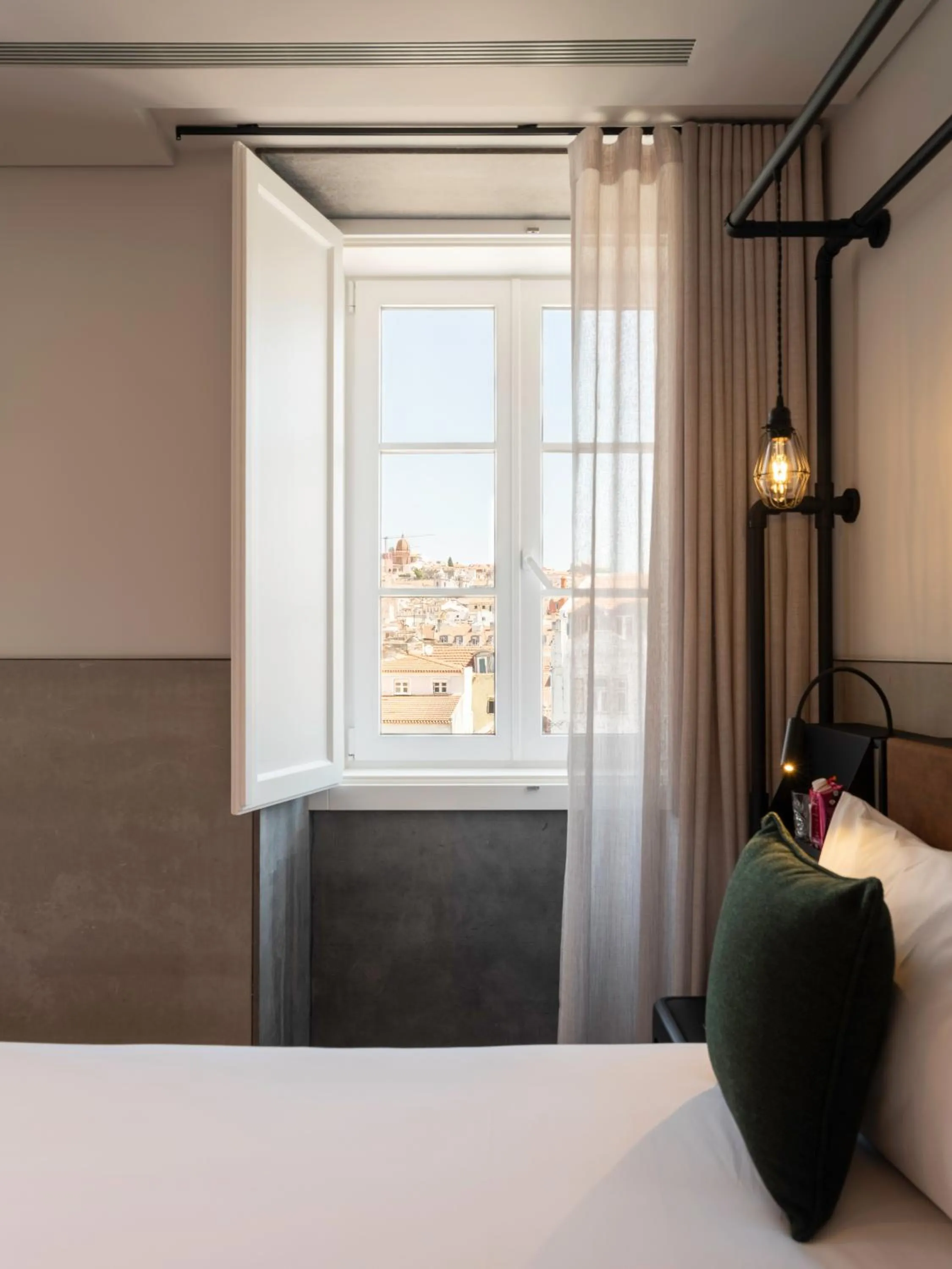 Bed in Inspira Santos Boutique Hotel