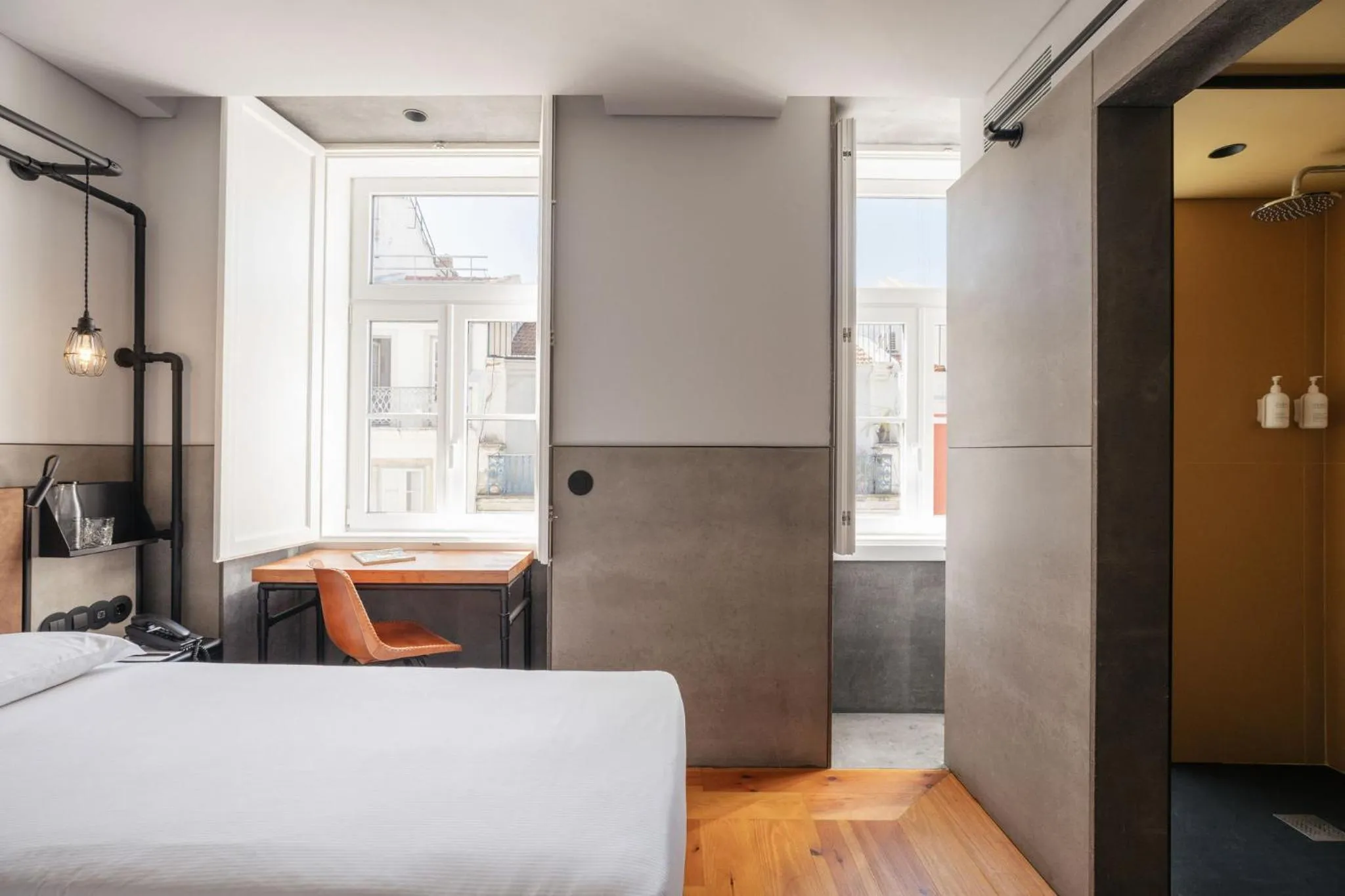 Bed in Inspira Santos Boutique Hotel