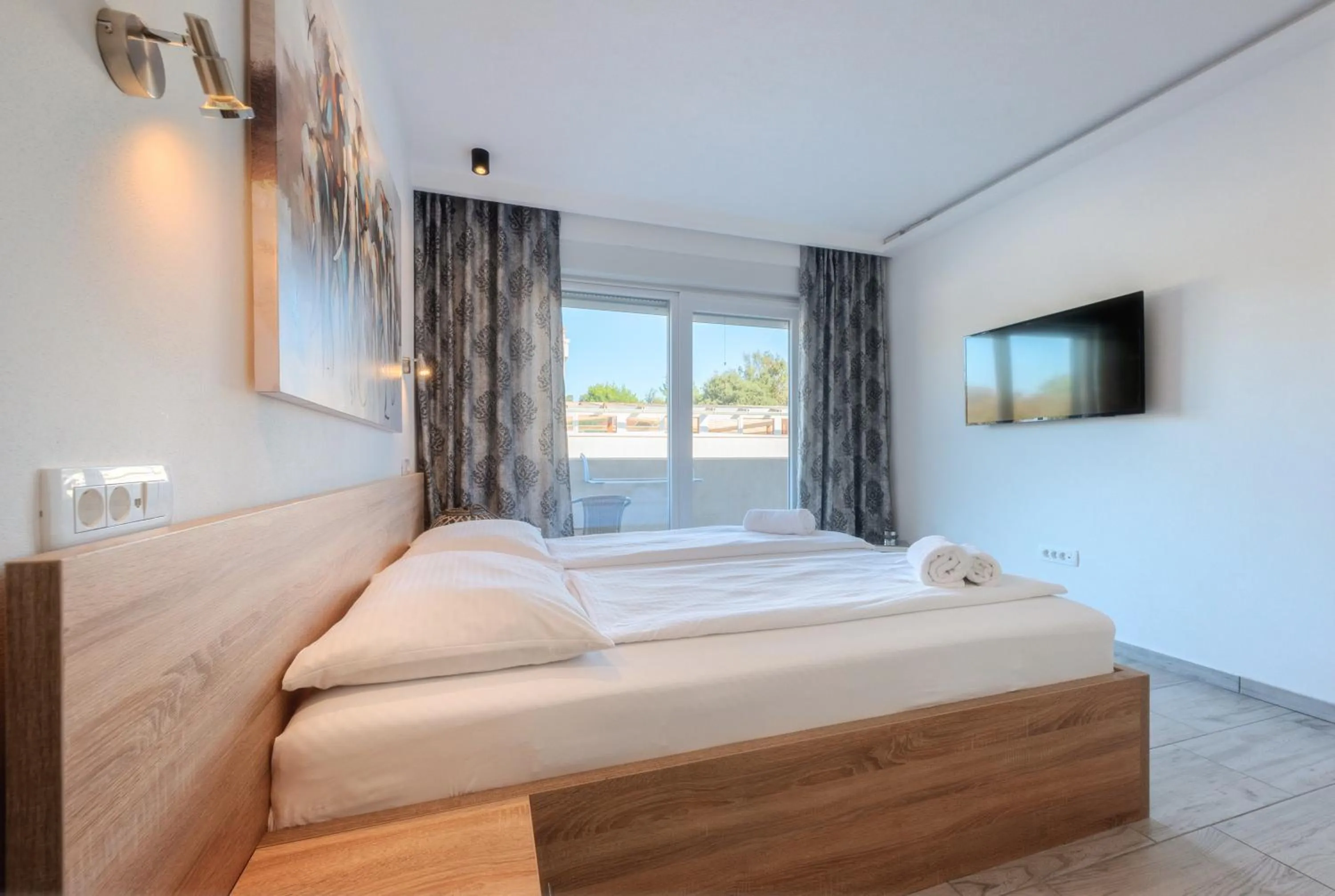 Bed in Aparthotel Plat