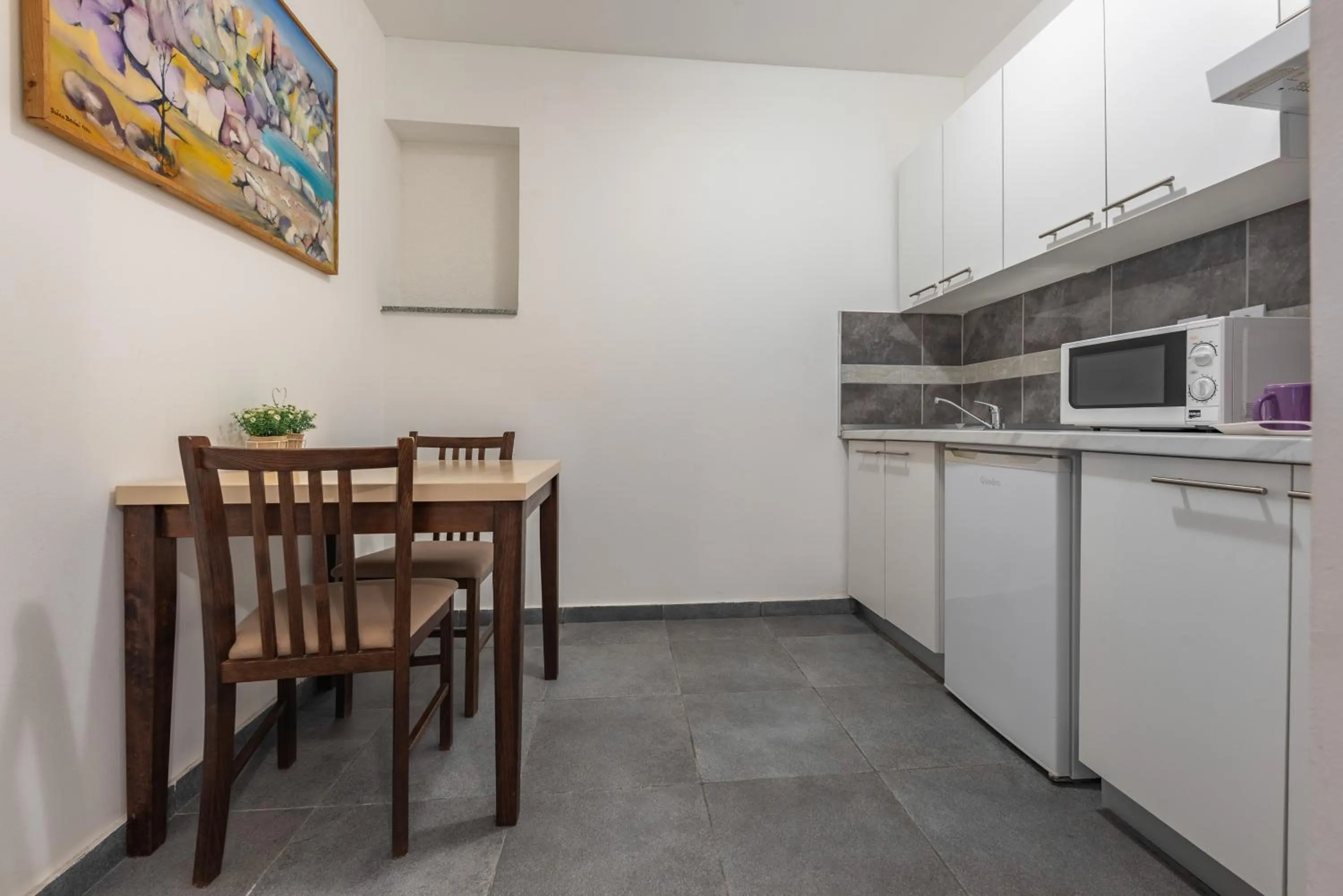 Kitchen or kitchenette in Aparthotel Plat