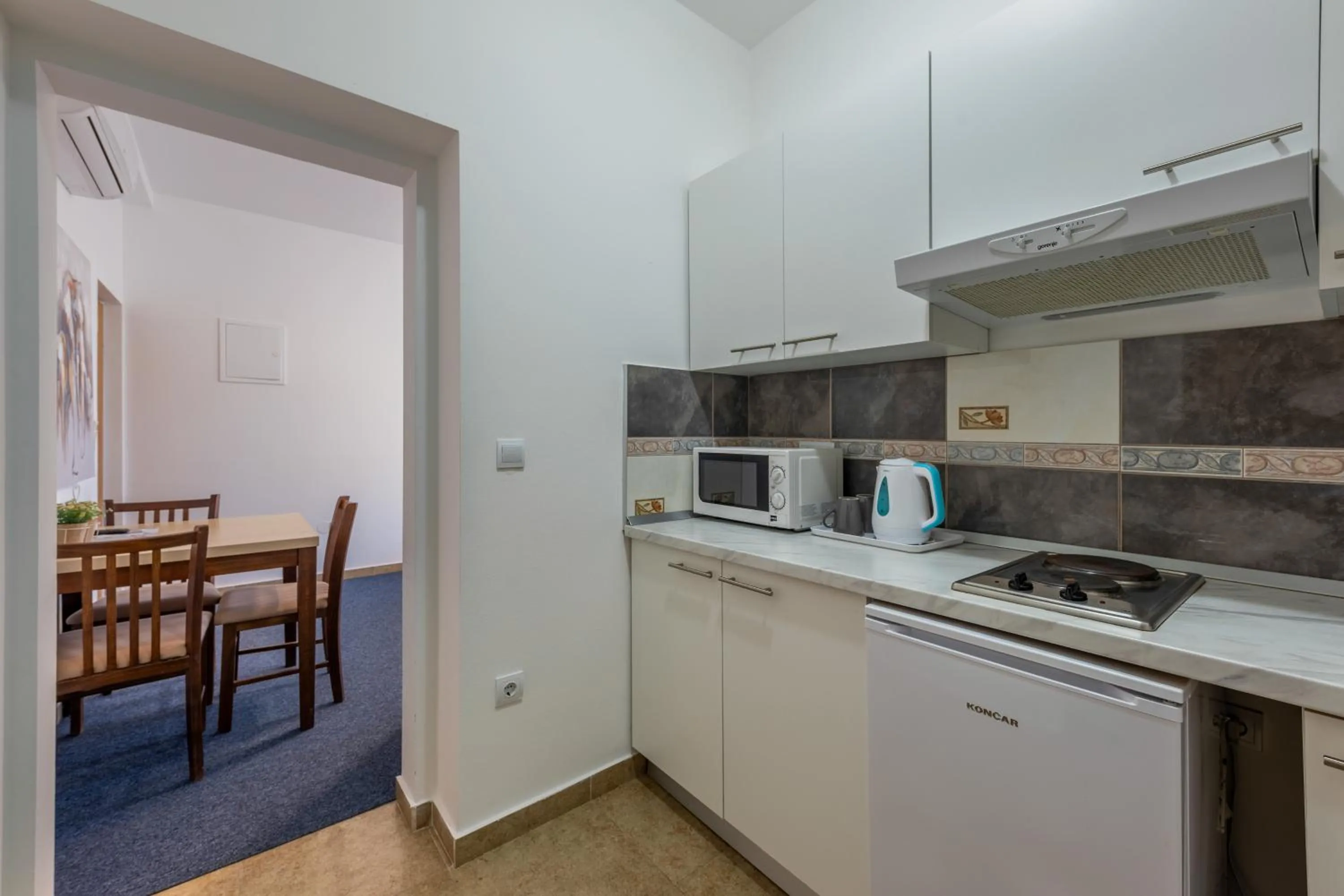 Kitchen or kitchenette in Aparthotel Plat