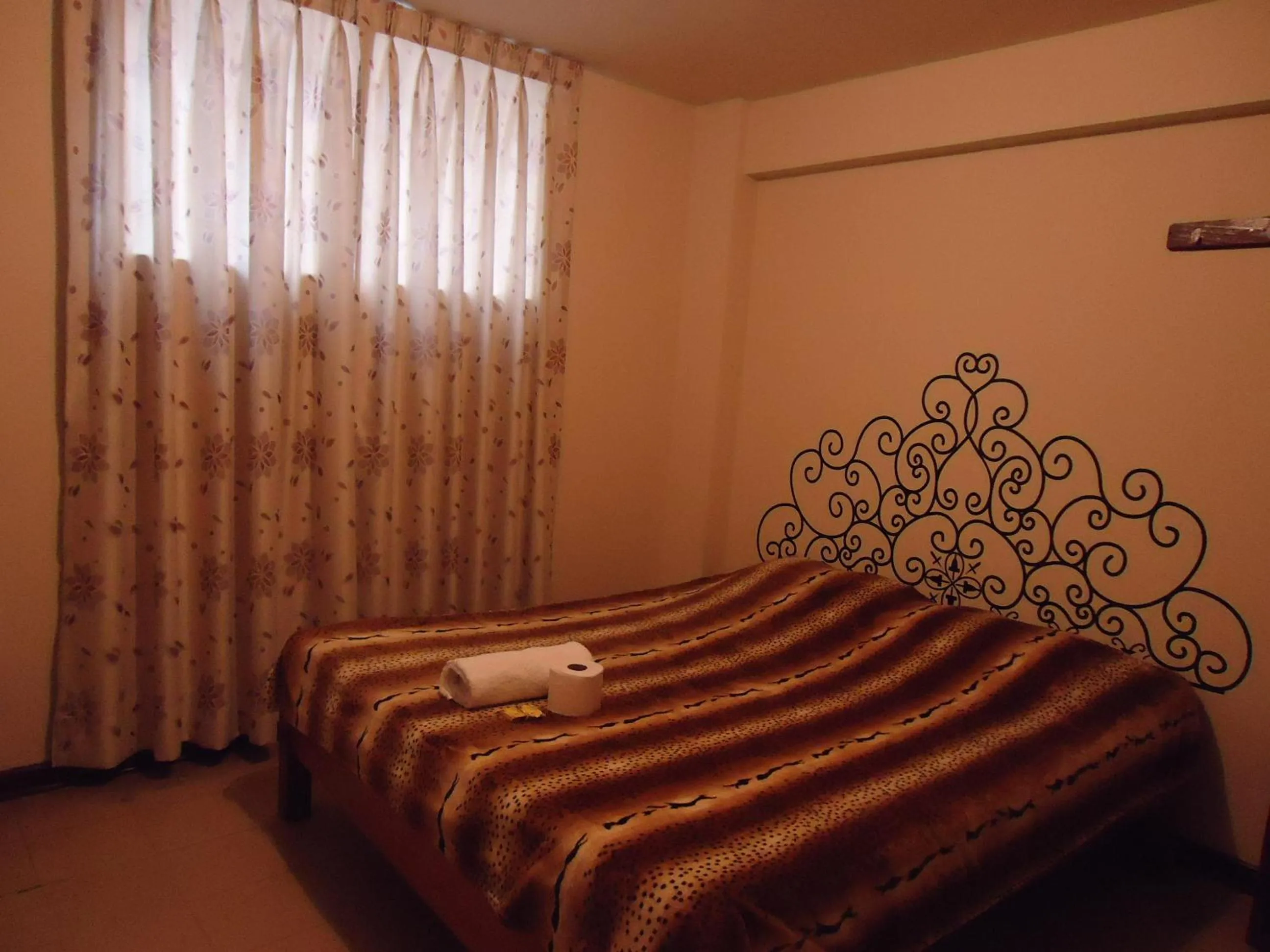 Decorative detail, Bed in Hotel Estación Central