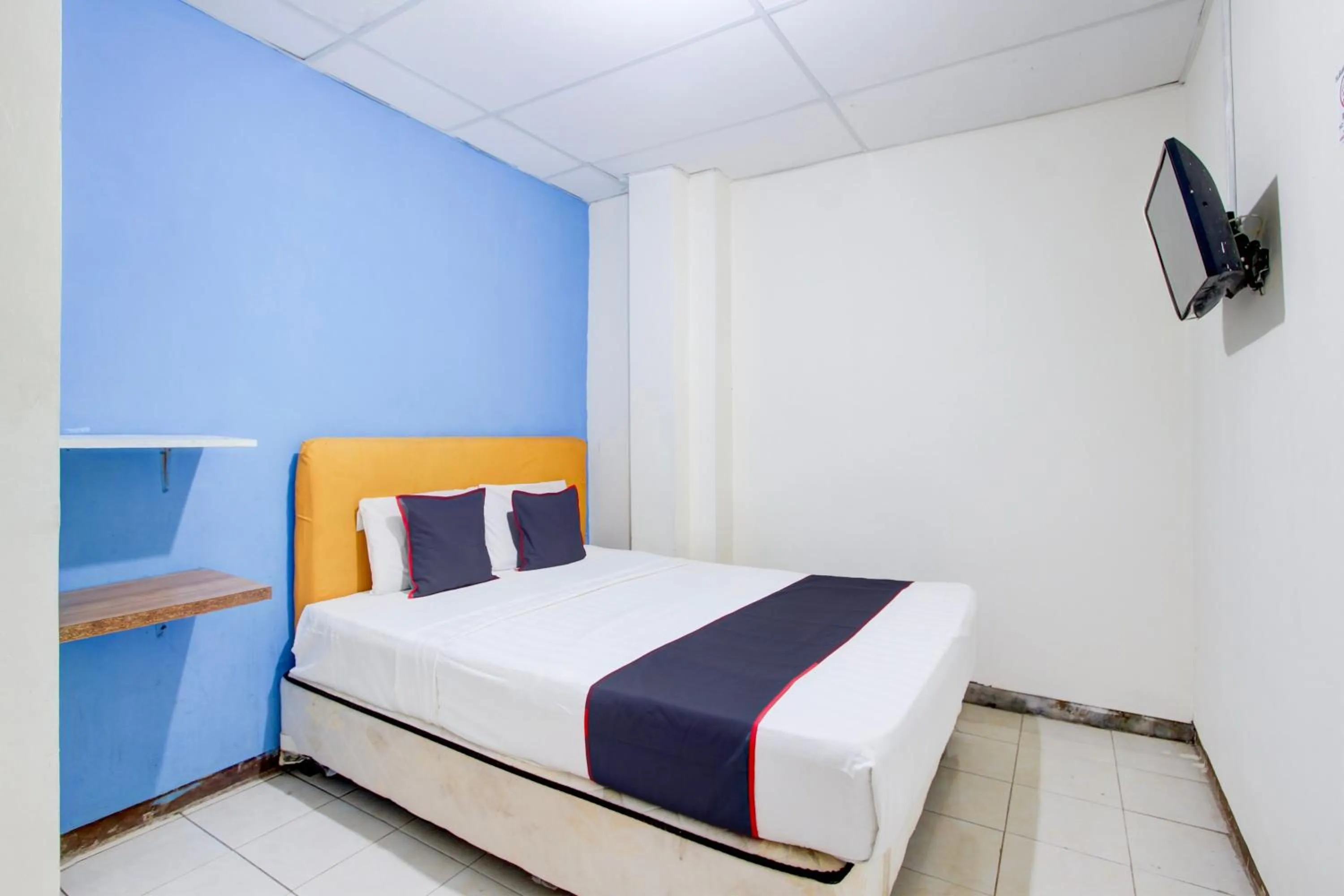 Bedroom in Hotel O Semarang near Kota Lama Semarang formerly Kamarkoe Residence