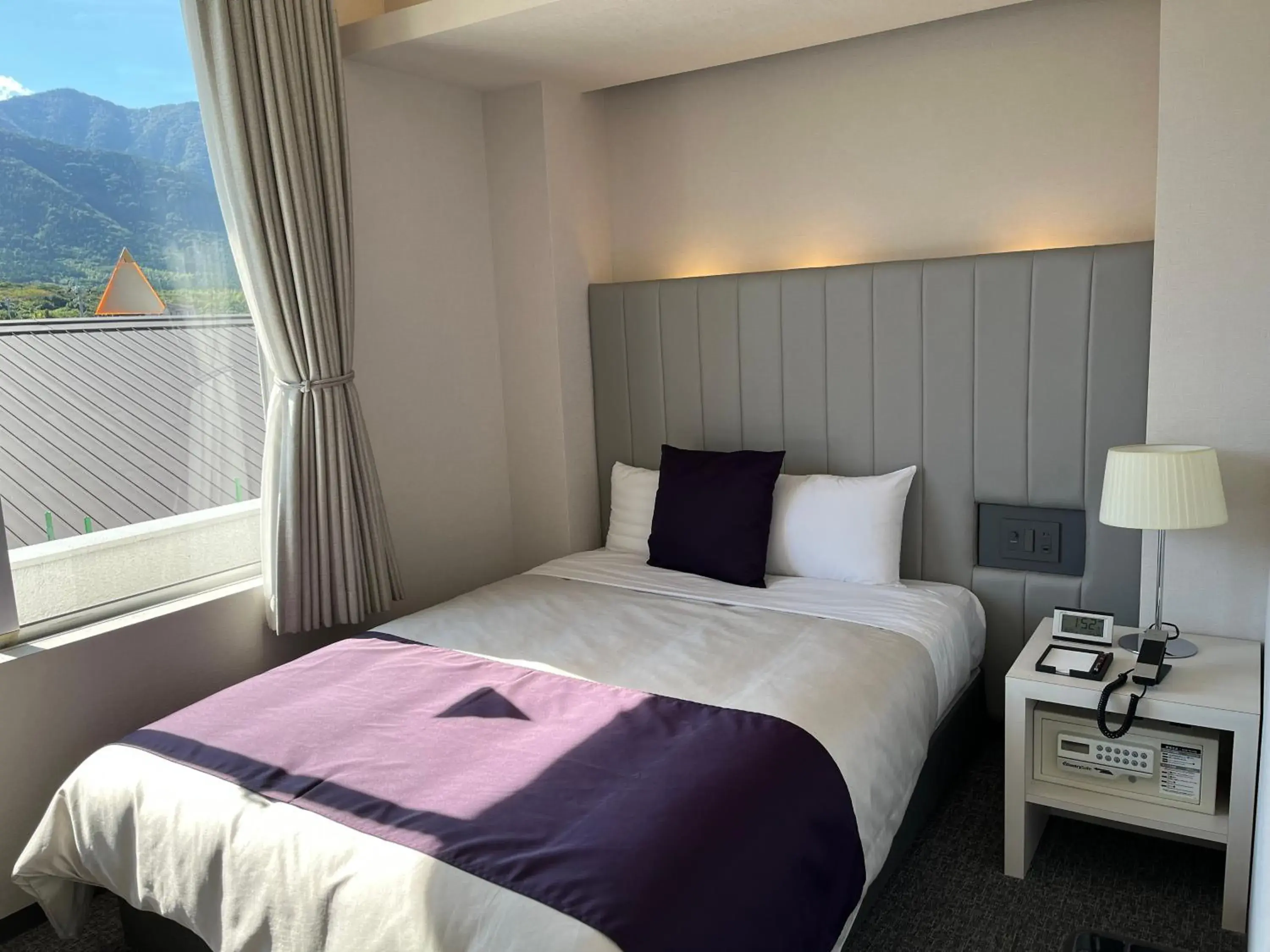 Bed in THE HOTEL YAKUSHIMA ocean & forest Bed in THE HOTEL YAKUSHIMA ocean & forest