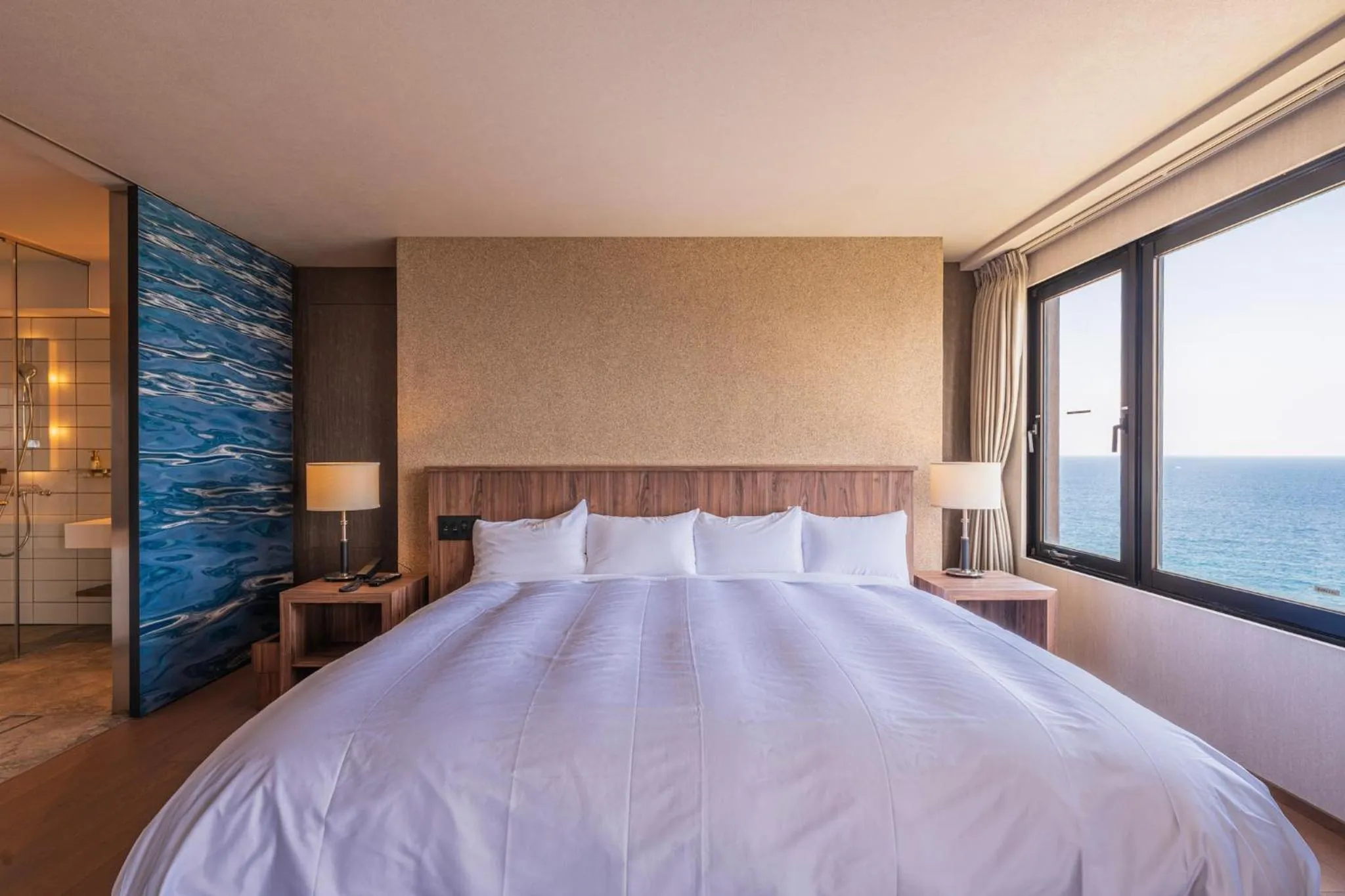 Bed in THE HOTEL YAKUSHIMA ocean & forest