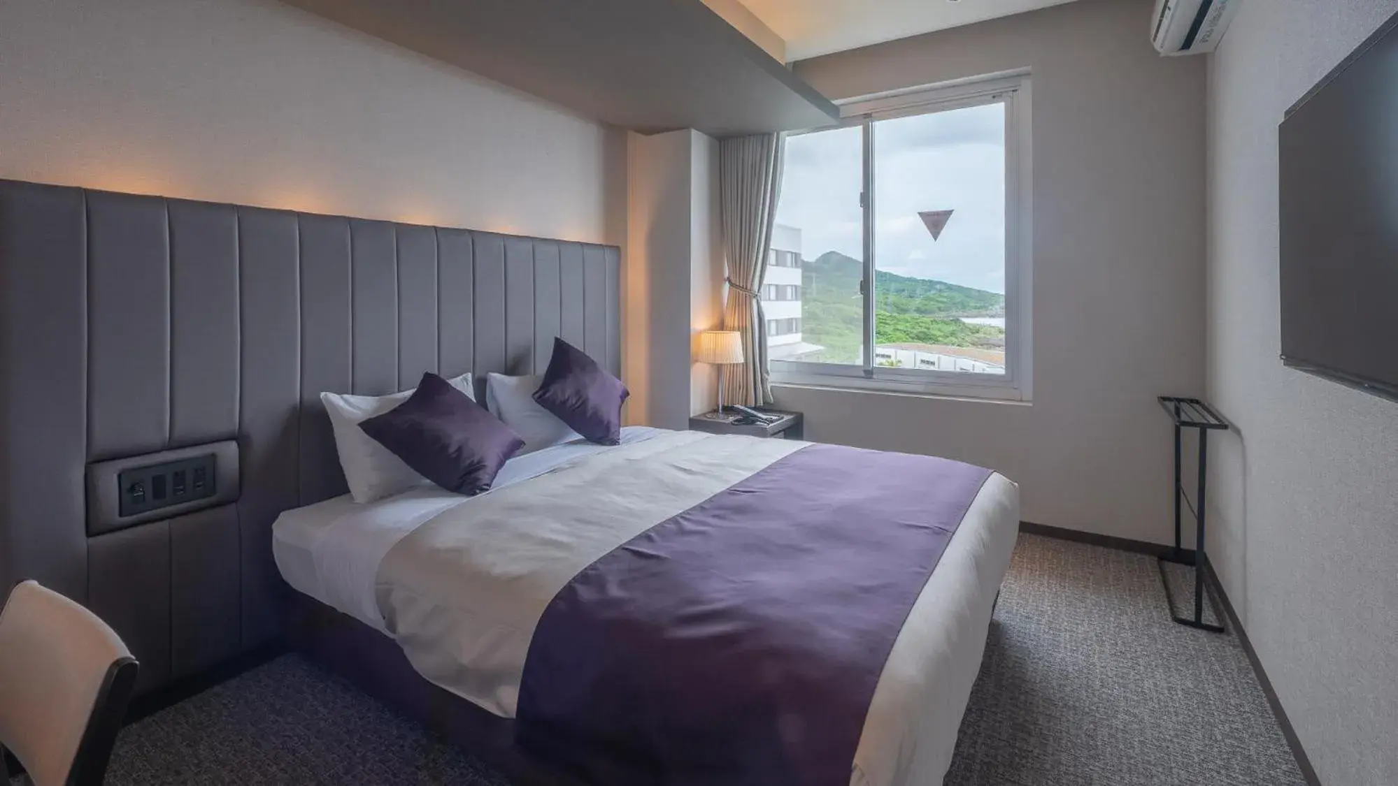 Bed in THE HOTEL YAKUSHIMA ocean & forest Bed in THE HOTEL YAKUSHIMA ocean & forest