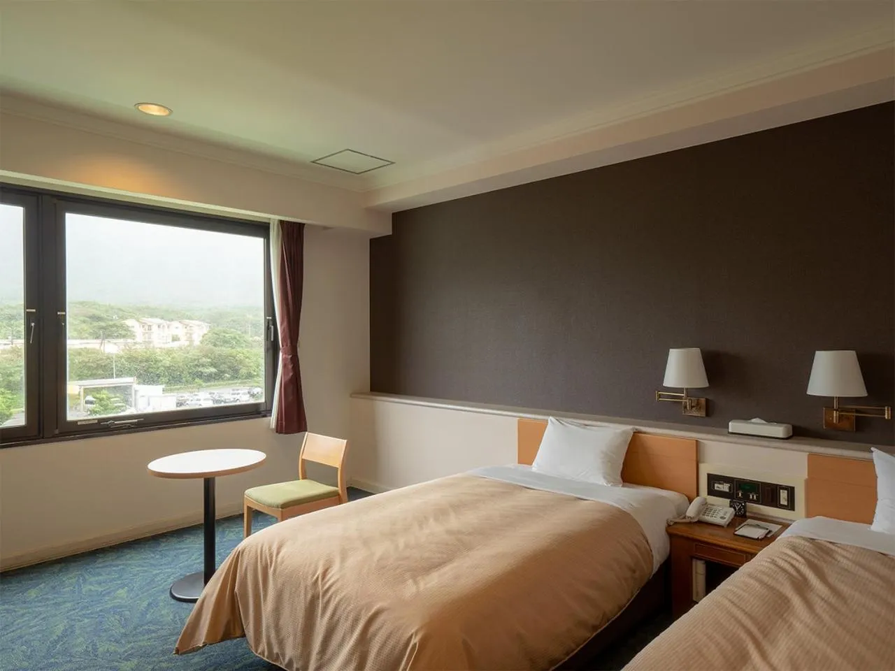 Bed in THE HOTEL YAKUSHIMA ocean & forest