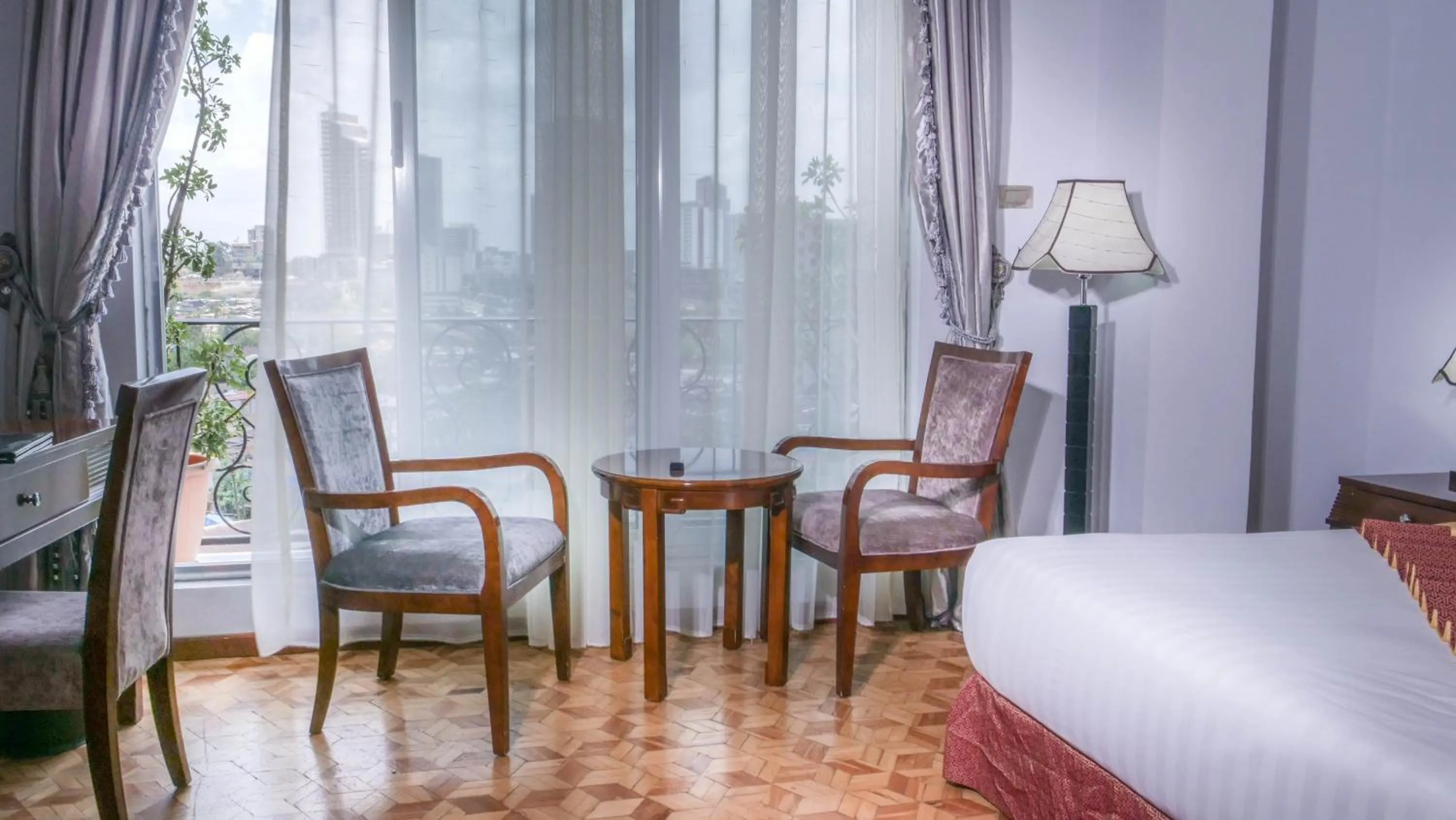 Living room, Bed in Tirar International Hotel