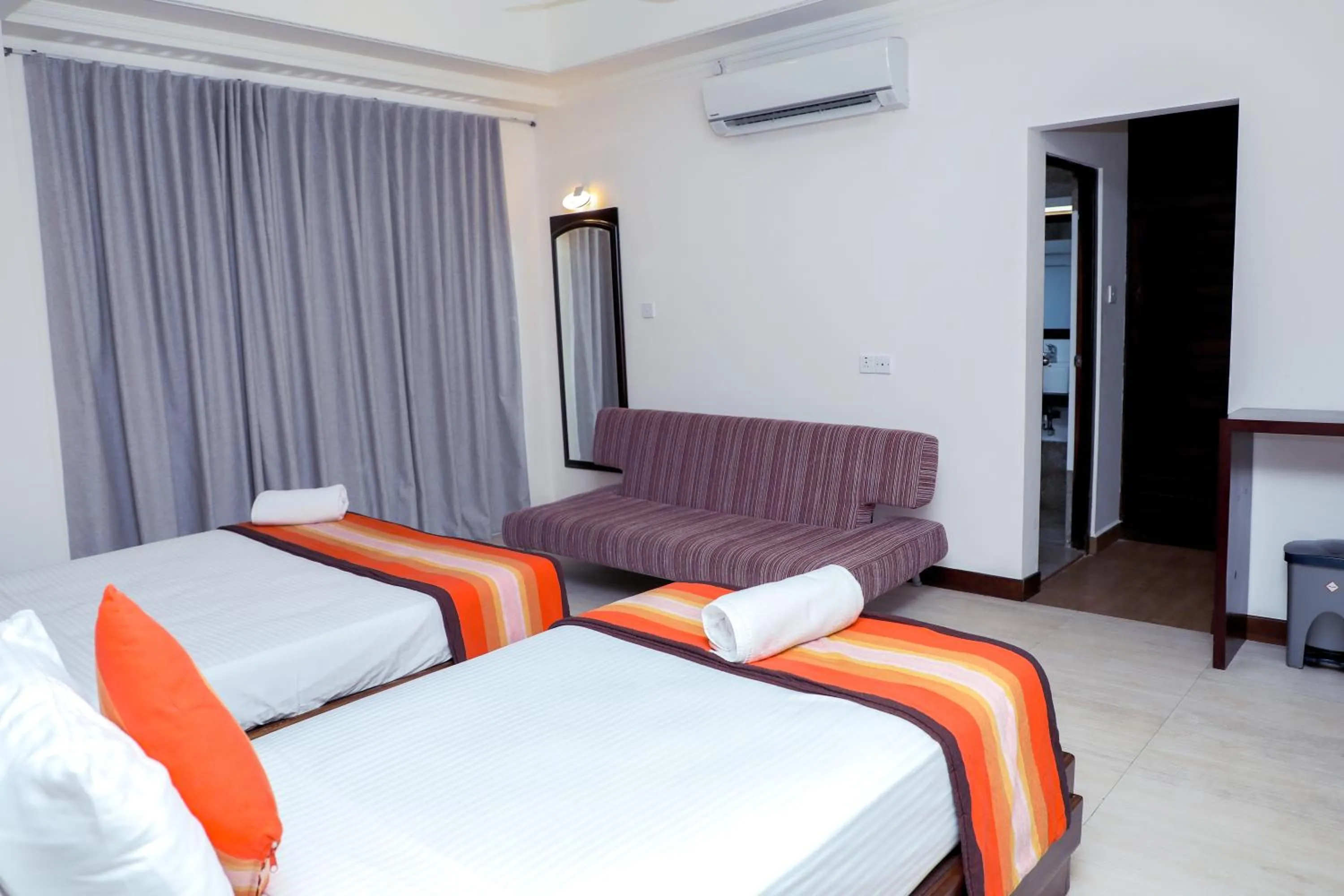 Photo of the whole room, Bed in The Valampuri