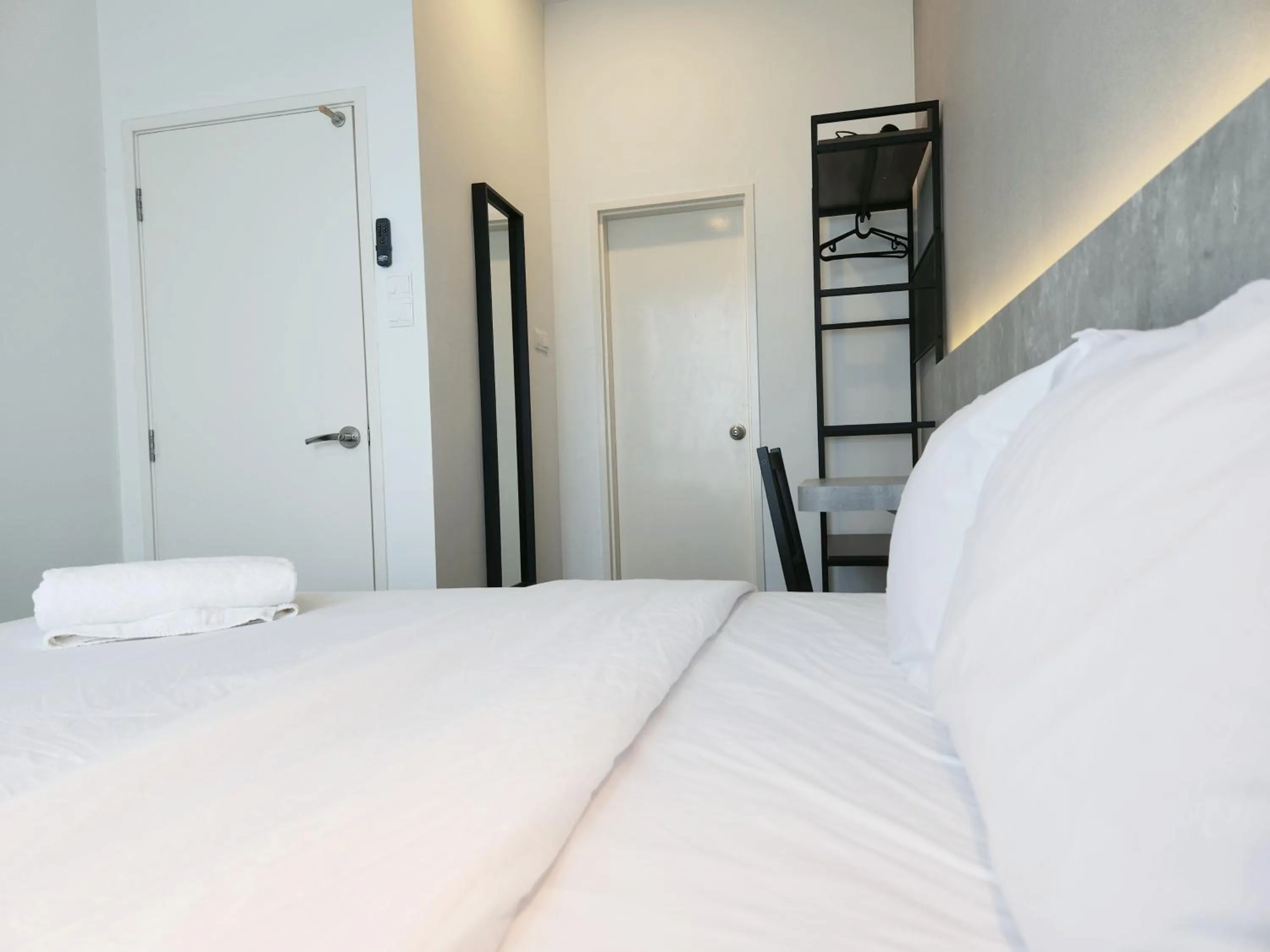 Bed in SKS Pavillion Suites