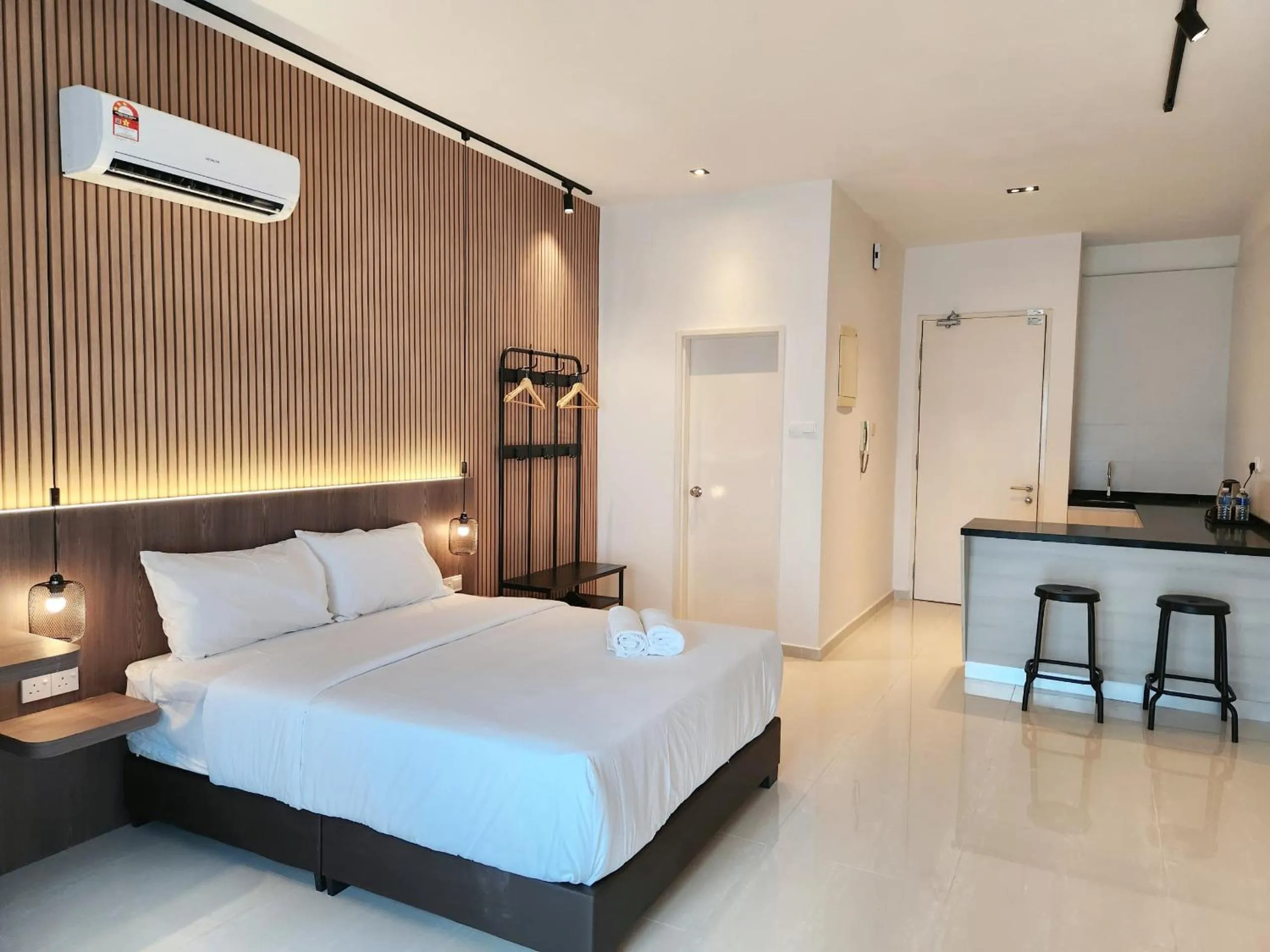 Bed in SKS Pavillion Suites